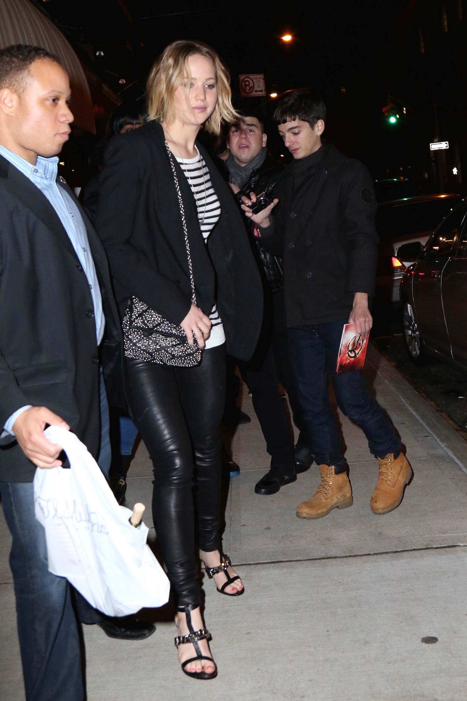 Jennifer Lawrence walking outside of the Greenwich Hotel