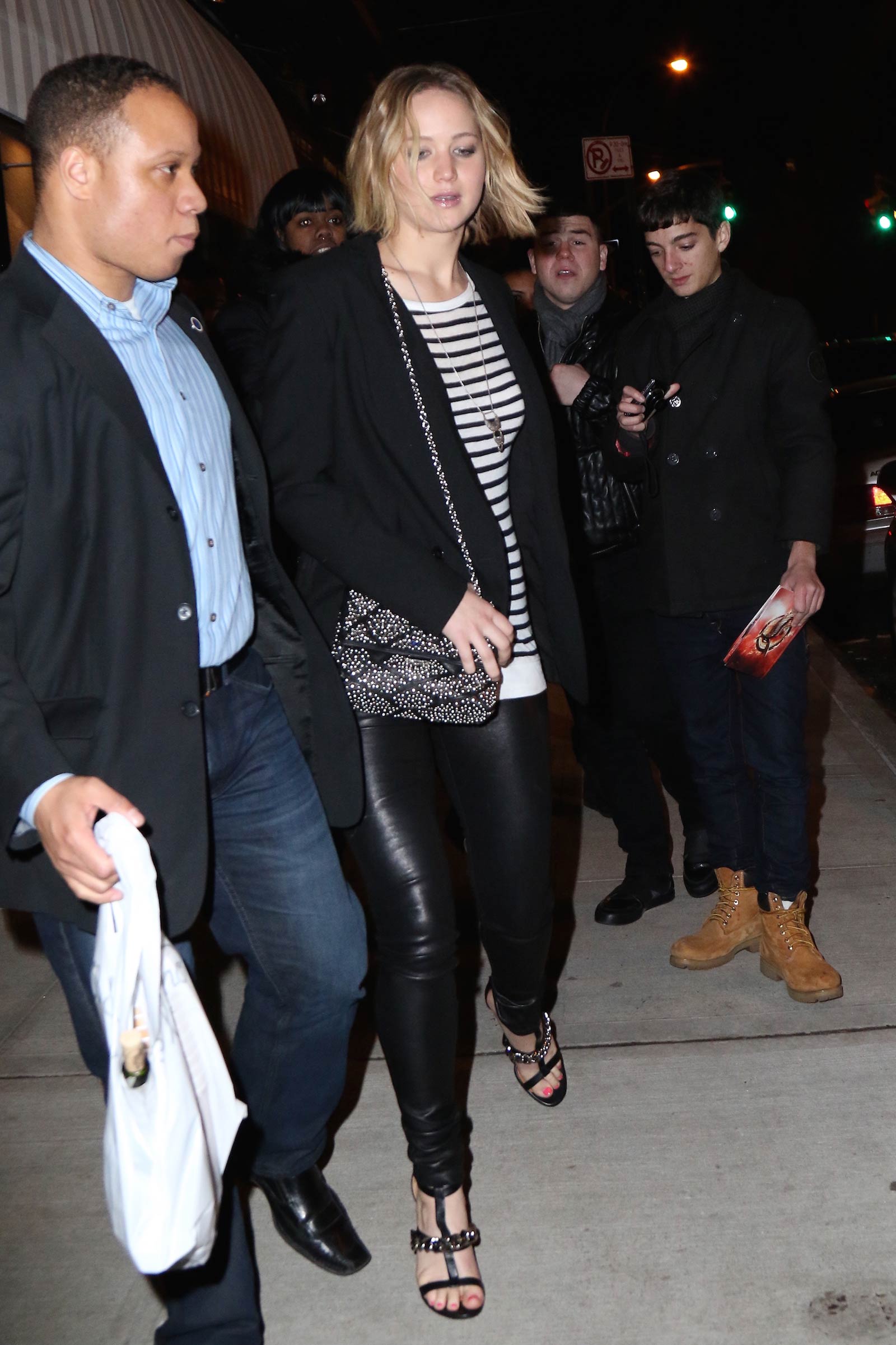 Jennifer Lawrence walking outside of the Greenwich Hotel