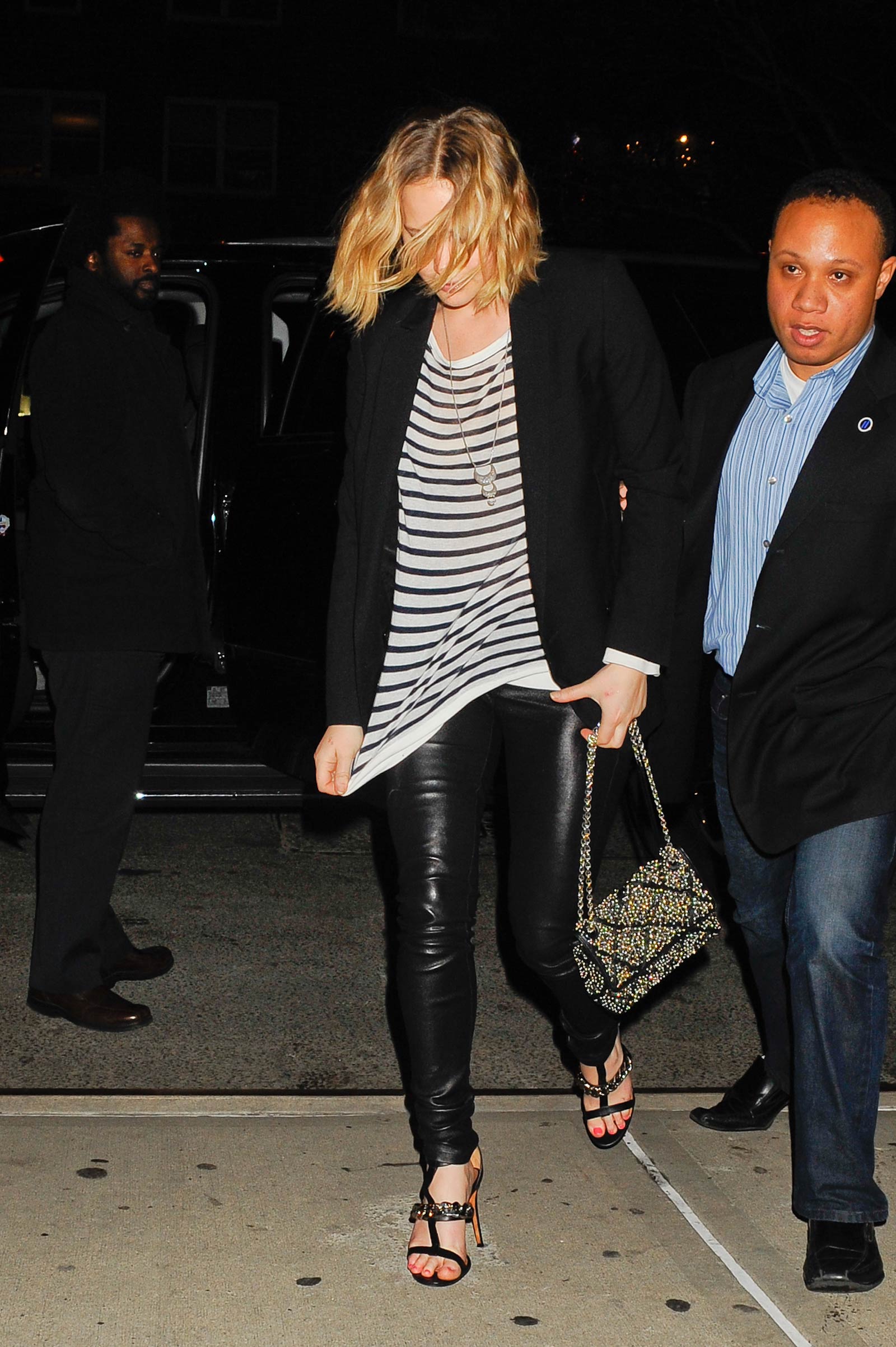 Jennifer Lawrence walking outside of the Greenwich Hotel