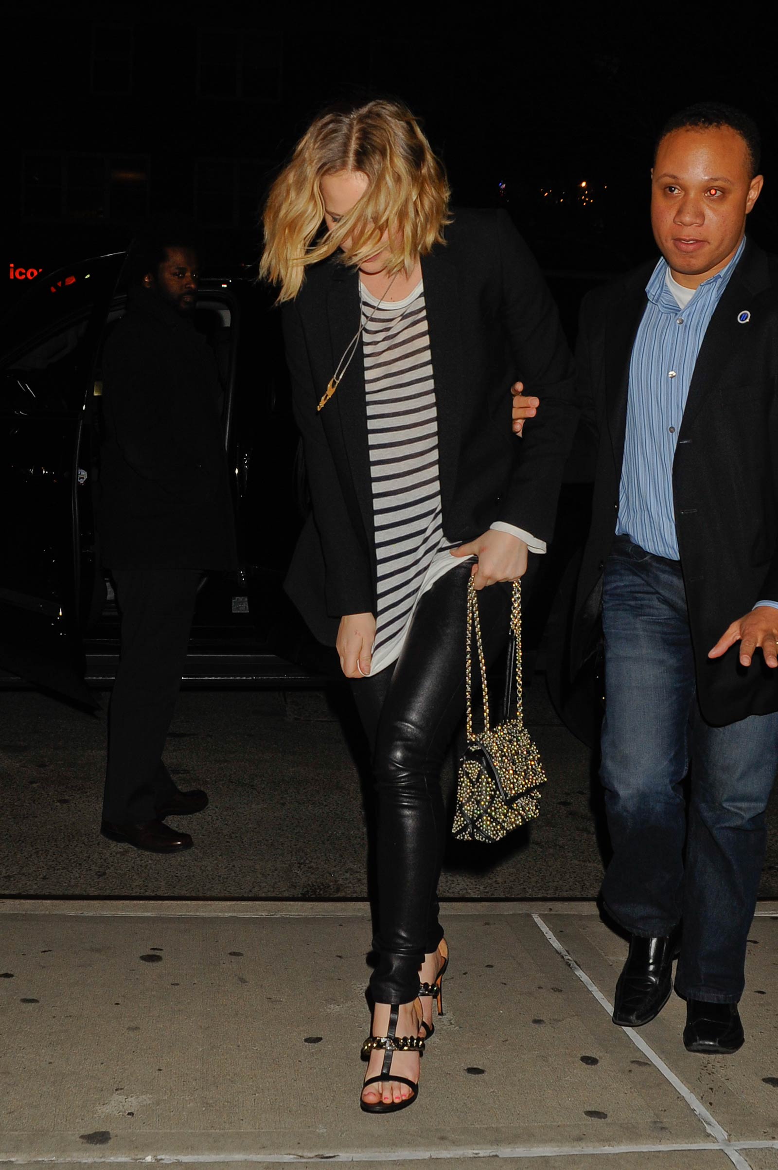 Jennifer Lawrence walking outside of the Greenwich Hotel