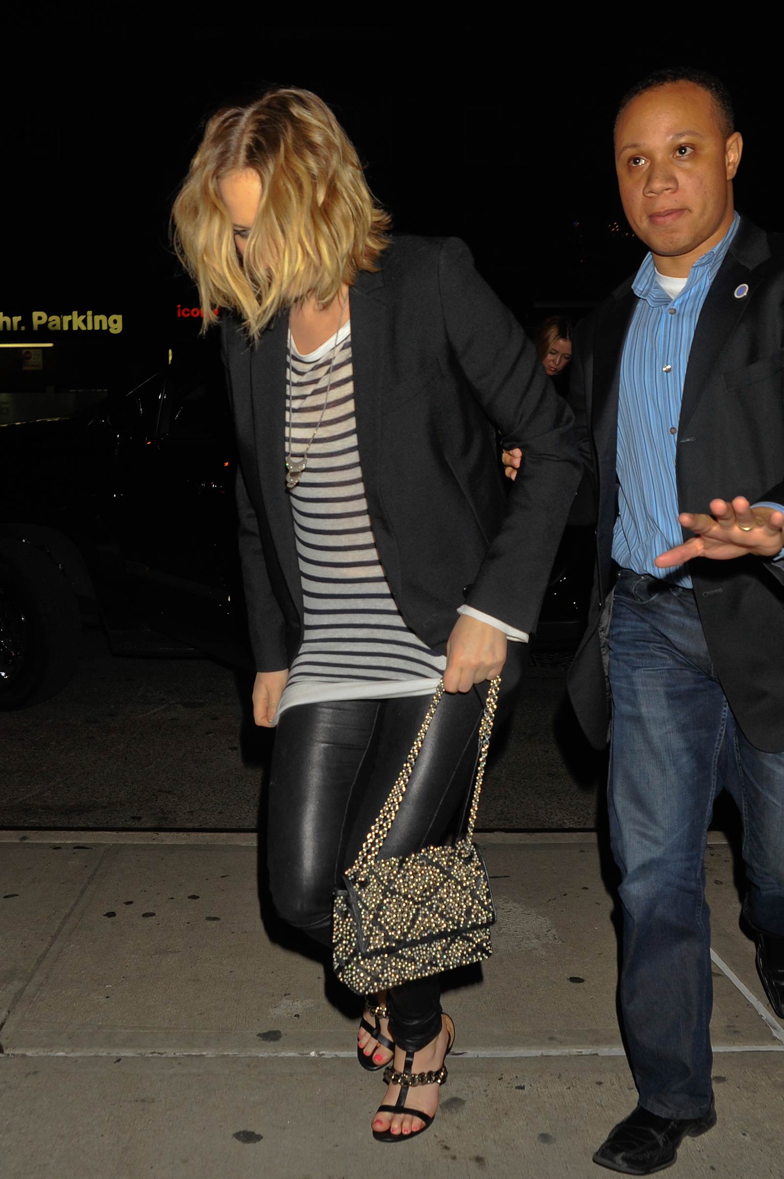 Jennifer Lawrence walking outside of the Greenwich Hotel