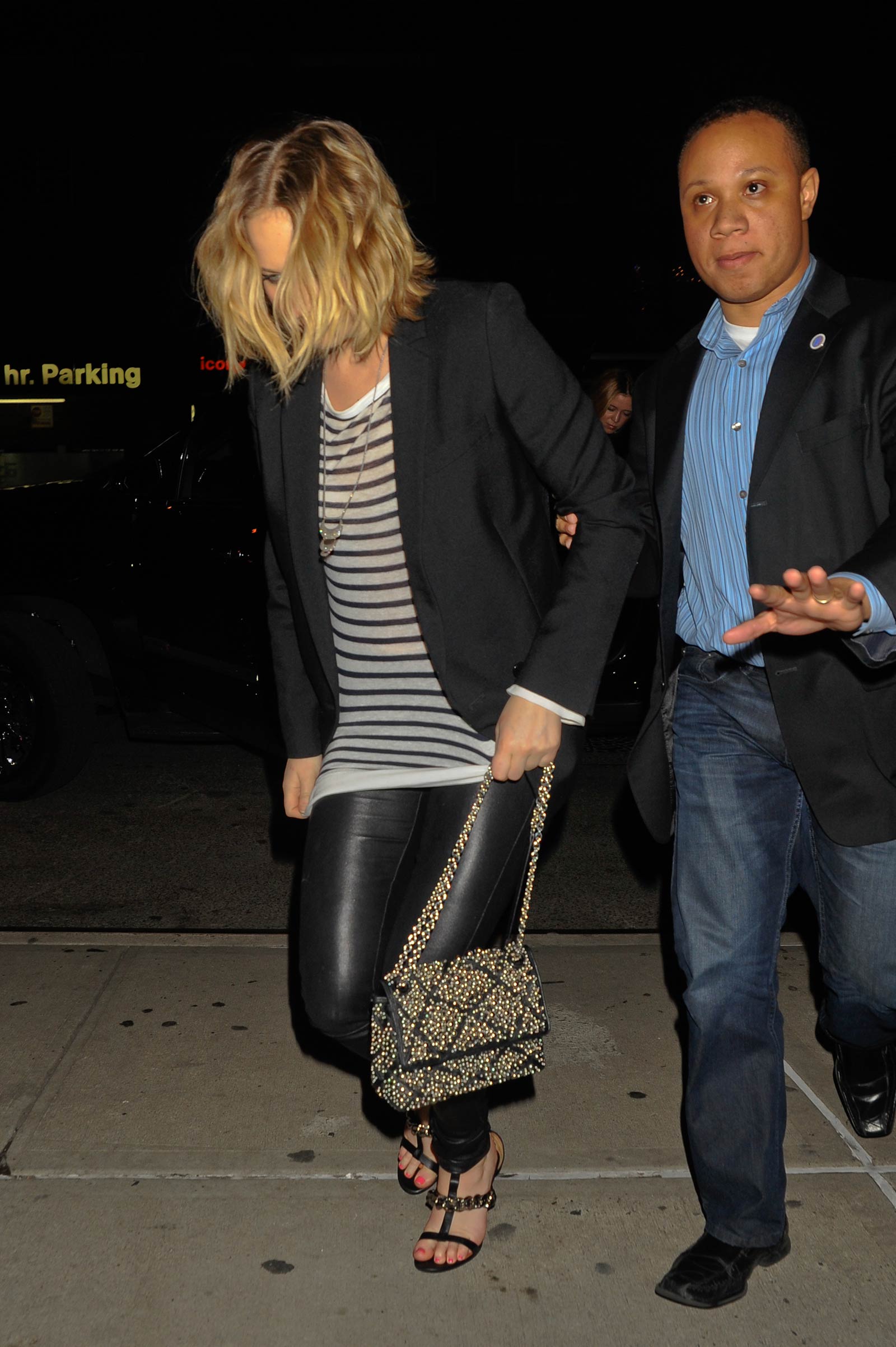 Jennifer Lawrence walking outside of the Greenwich Hotel