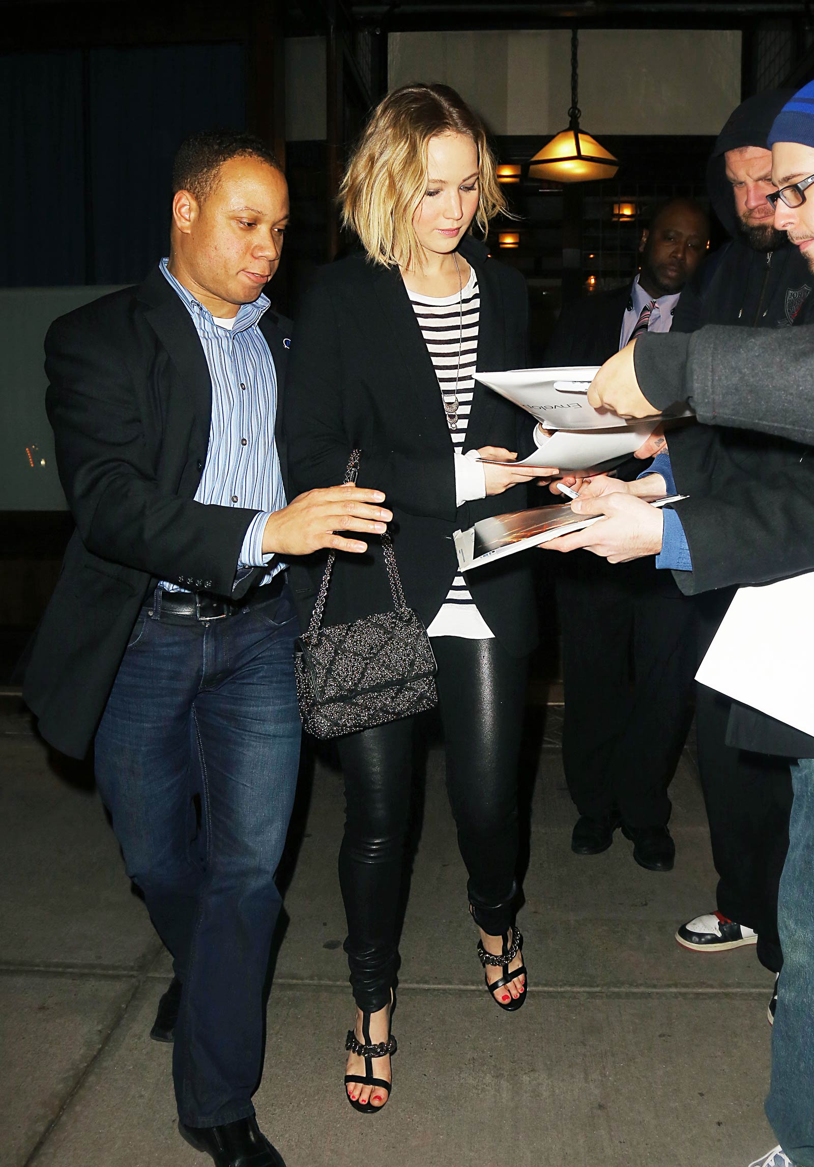 Jennifer Lawrence walking outside of the Greenwich Hotel