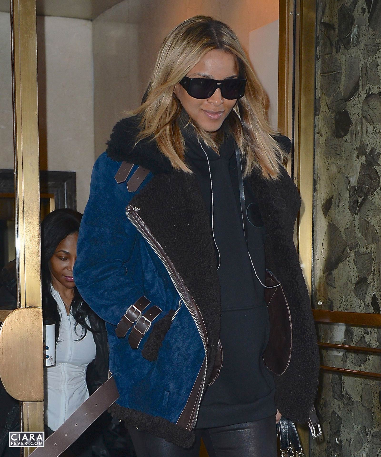 Ciara heads to the airport in New York City