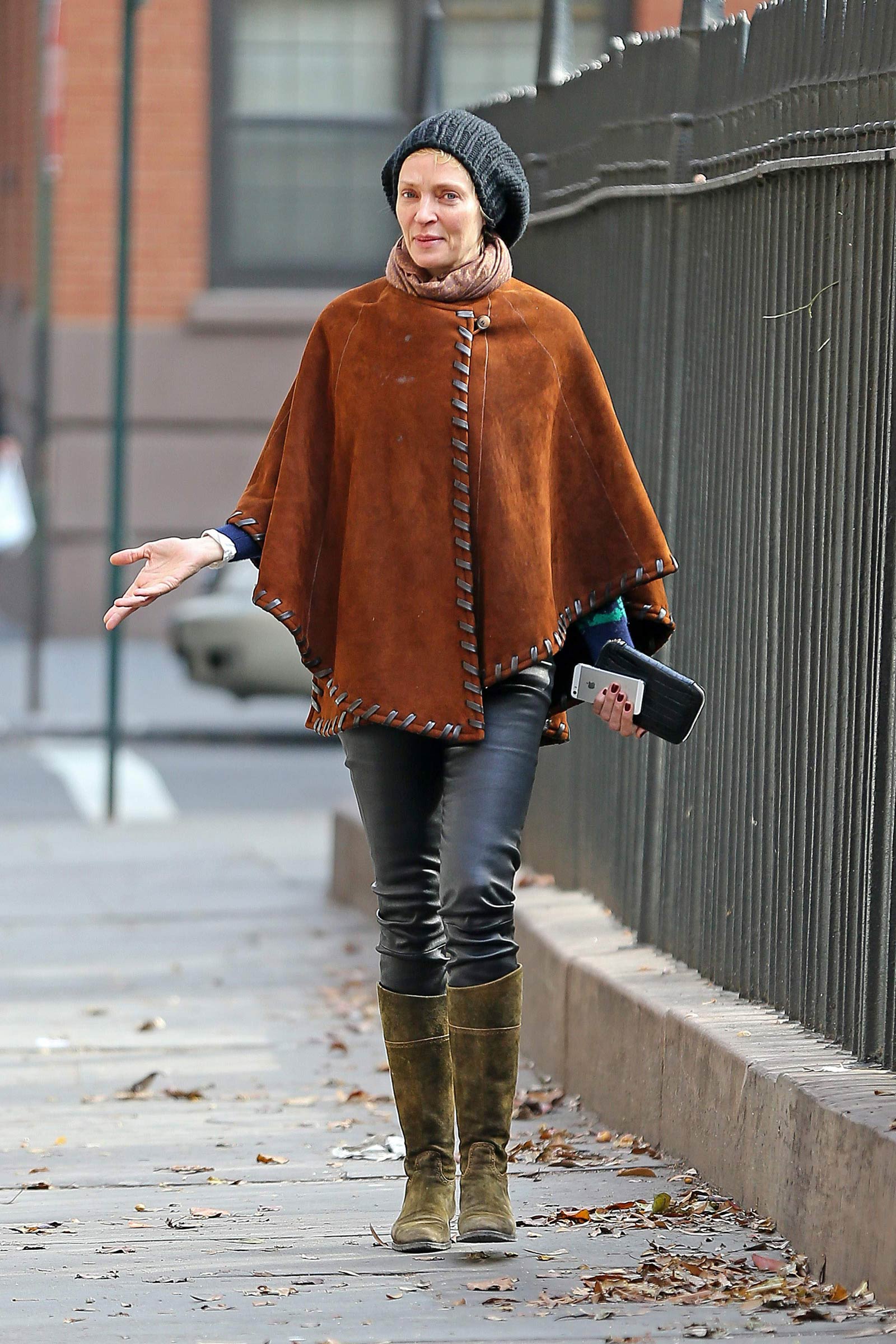 Uma Thurman walking around in New York City