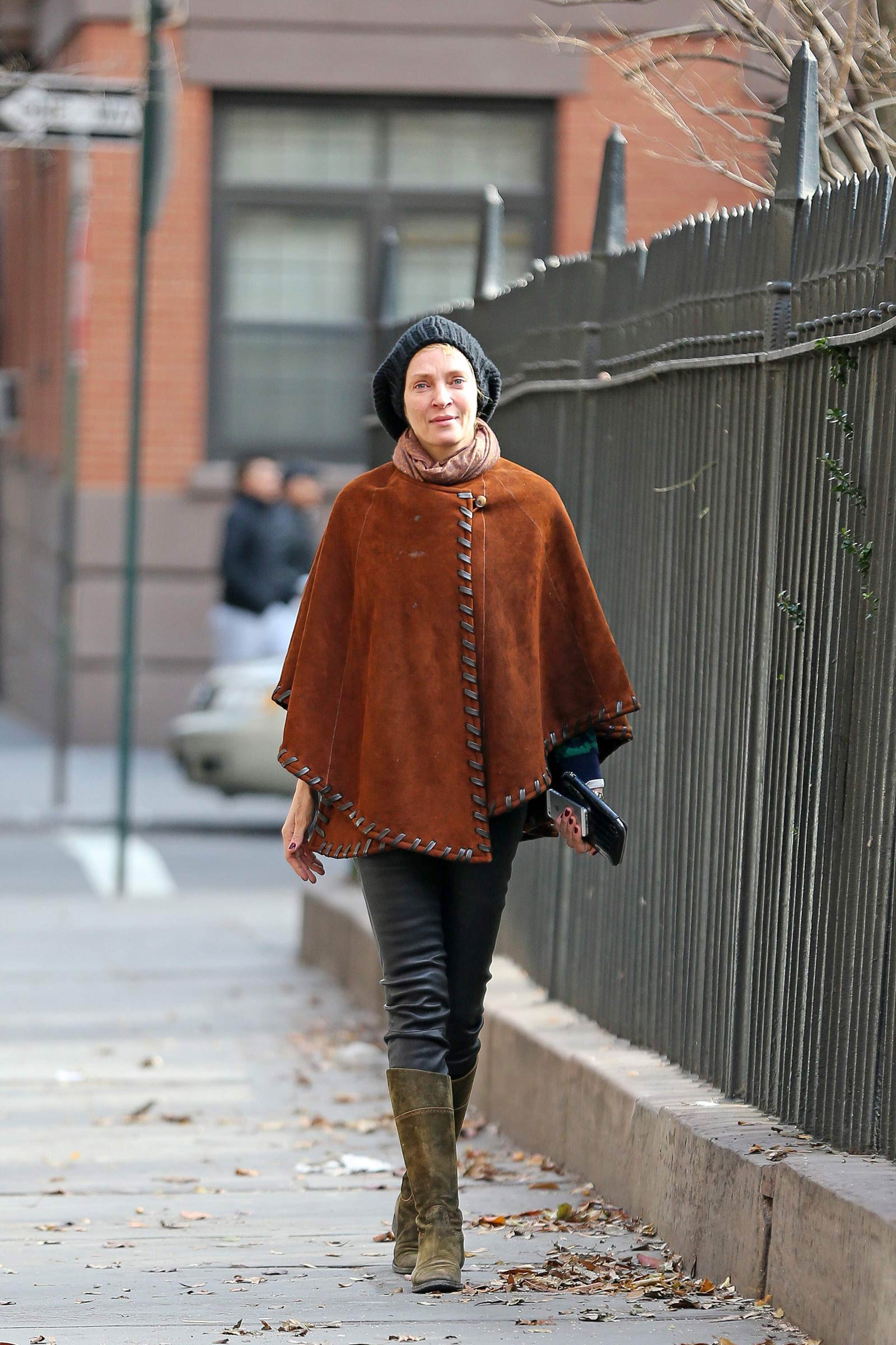 Uma Thurman walking around in New York City