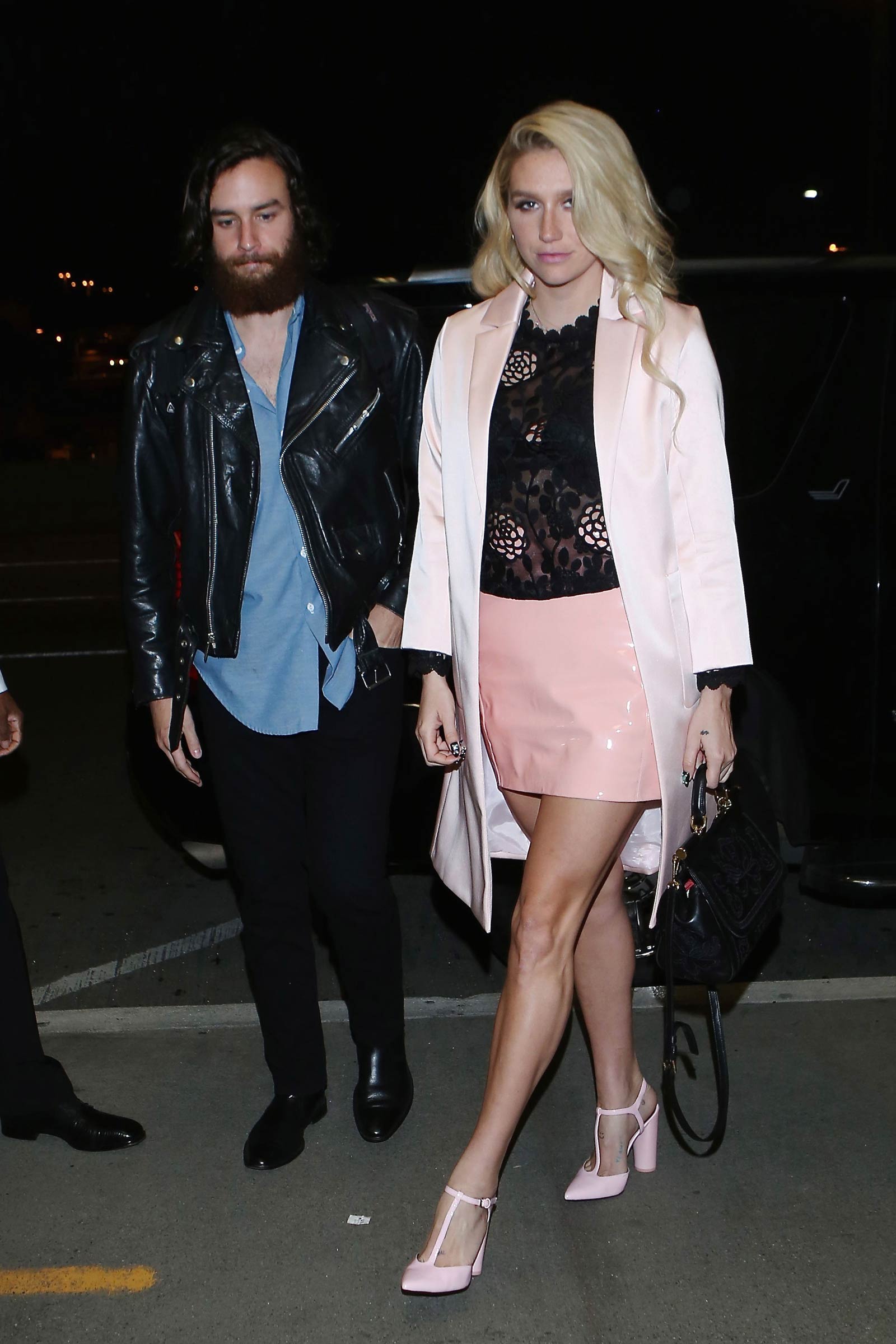 Kesha departing on a flight at LAX airport in Los Angeles