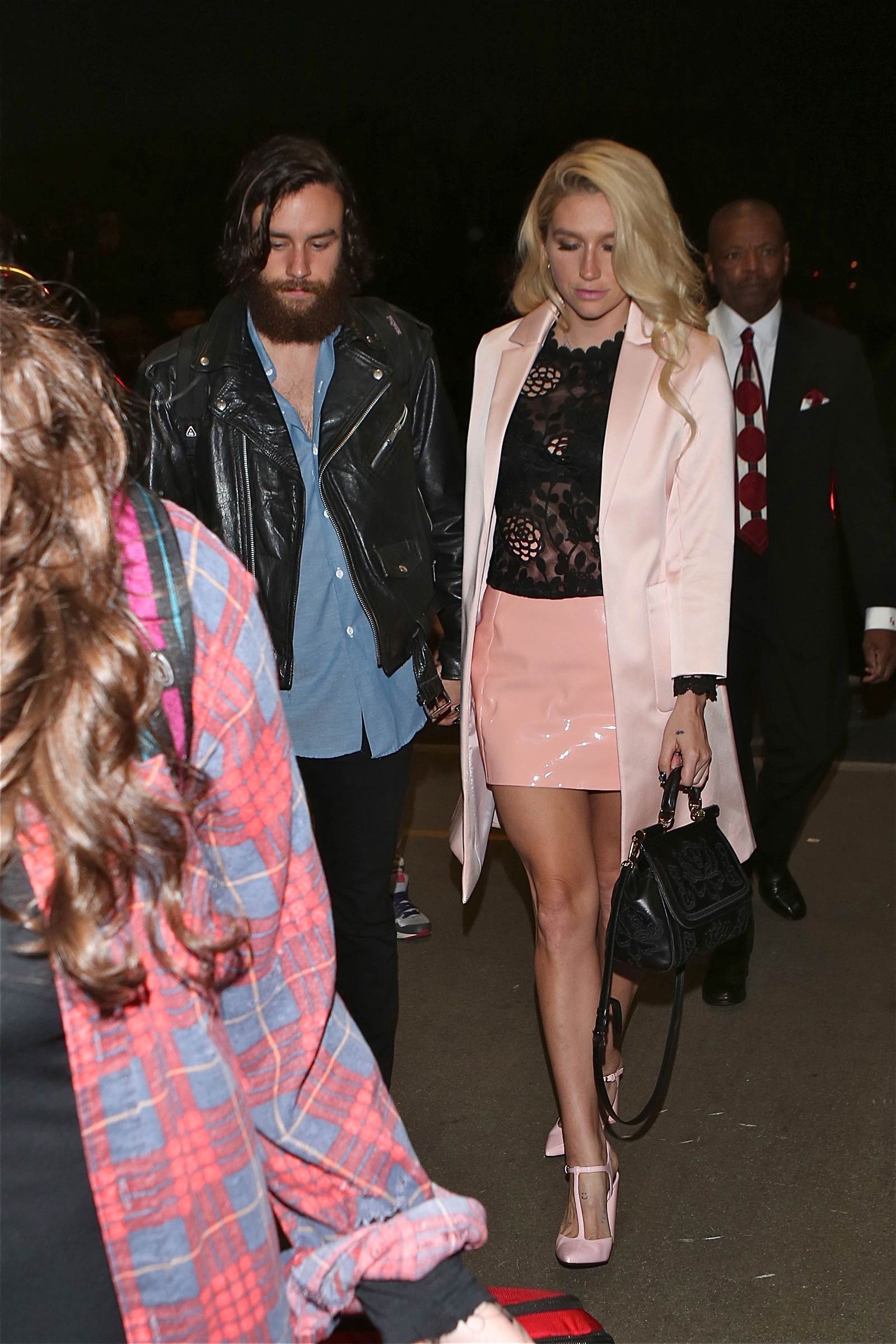 Kesha departing on a flight at LAX airport in Los Angeles