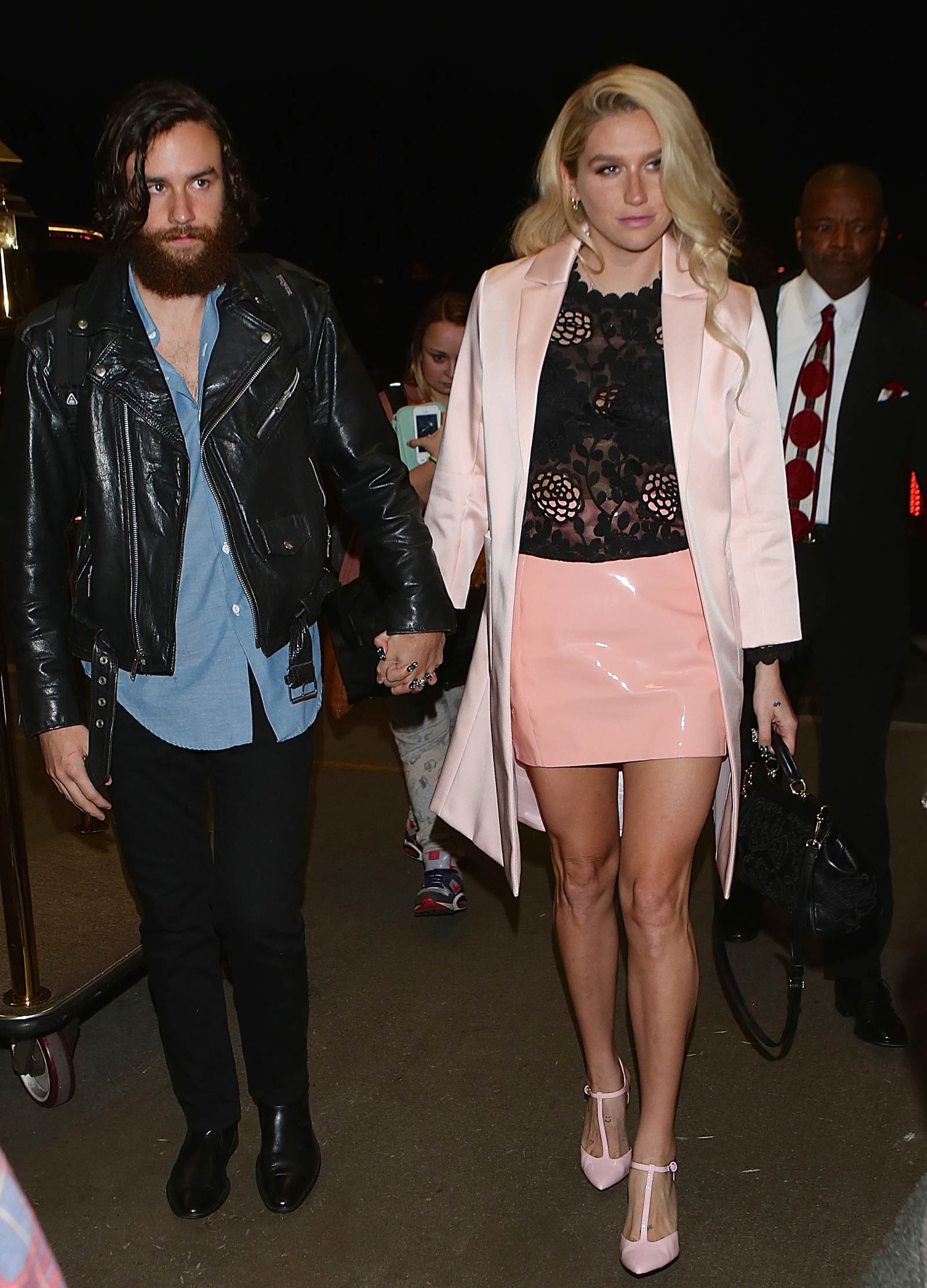 Kesha departing on a flight at LAX airport in Los Angeles