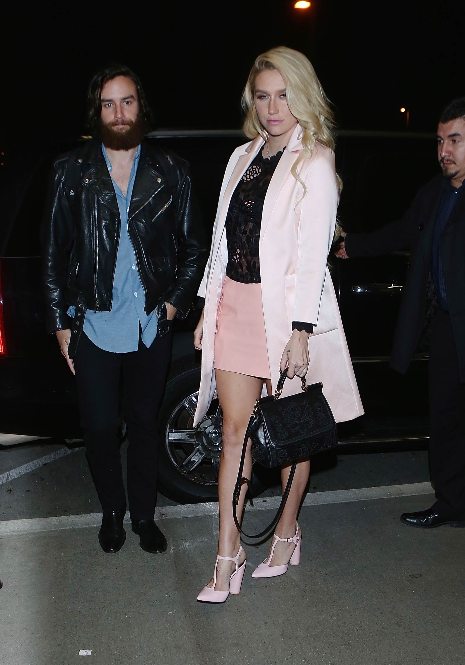 Kesha departing on a flight at LAX airport in Los Angeles