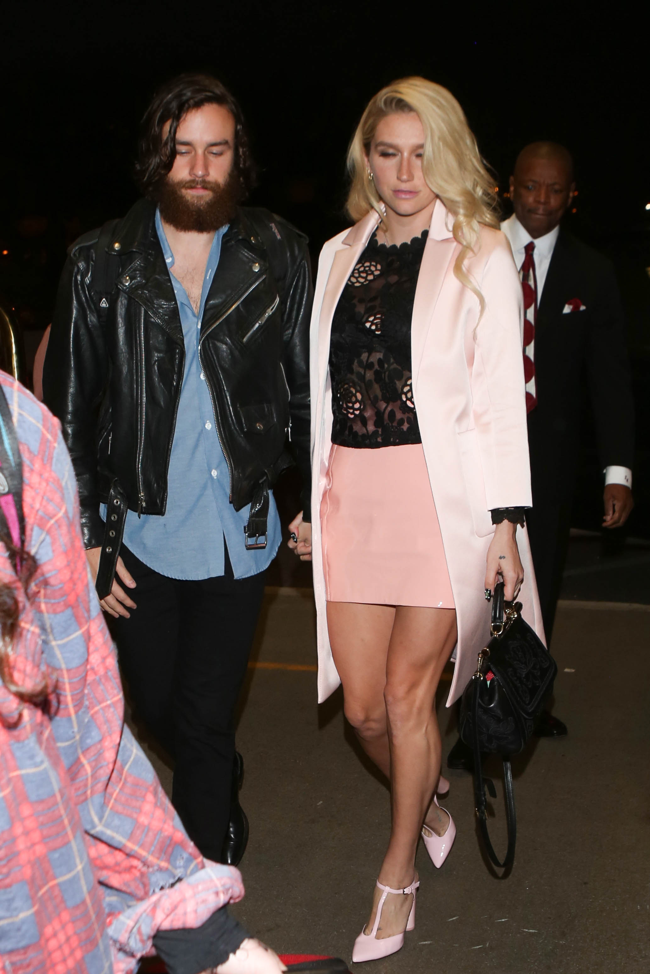 Kesha departing on a flight at LAX airport in Los Angeles