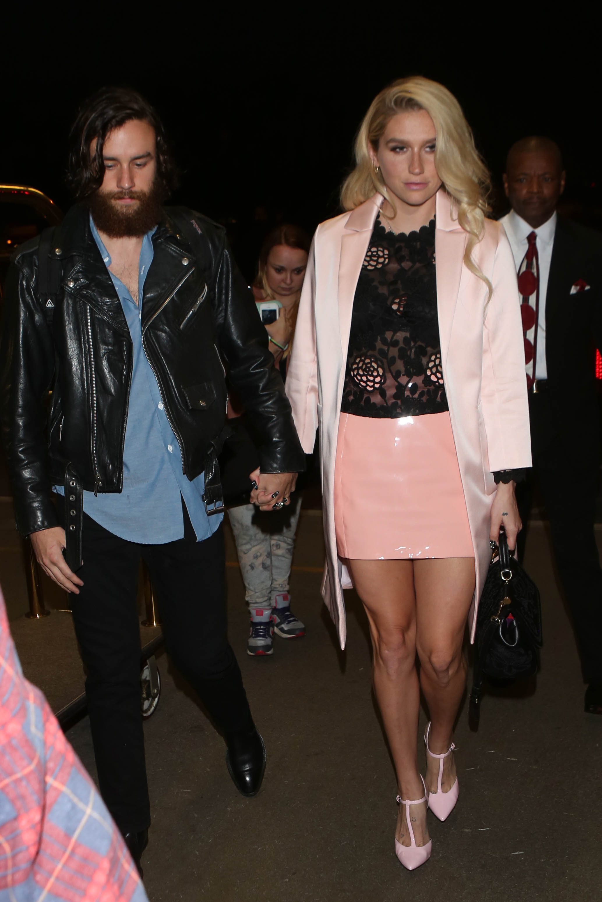 Kesha departing on a flight at LAX airport in Los Angeles