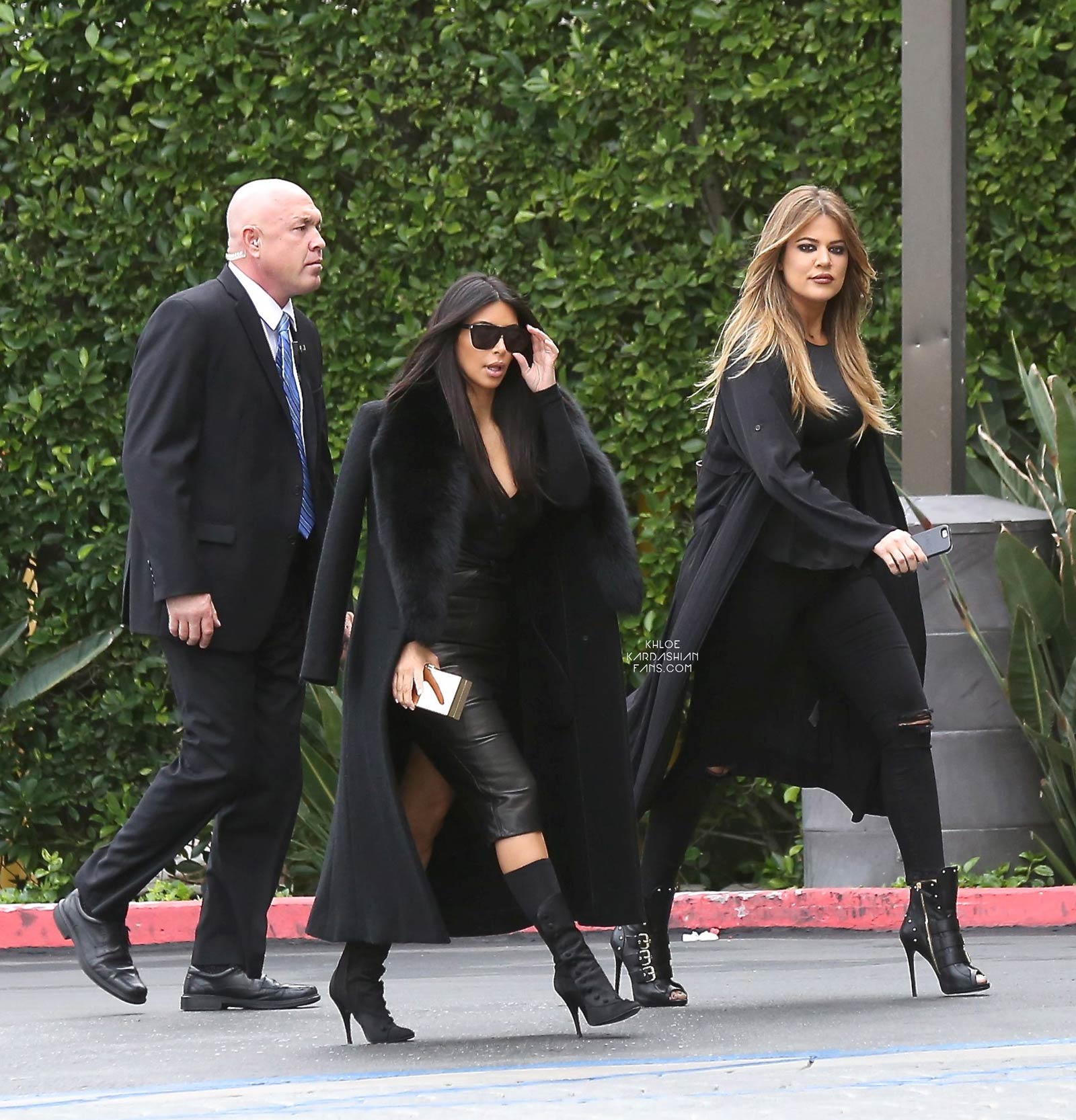 Kim & Khloe Kardashian arriving at Jenner Communications