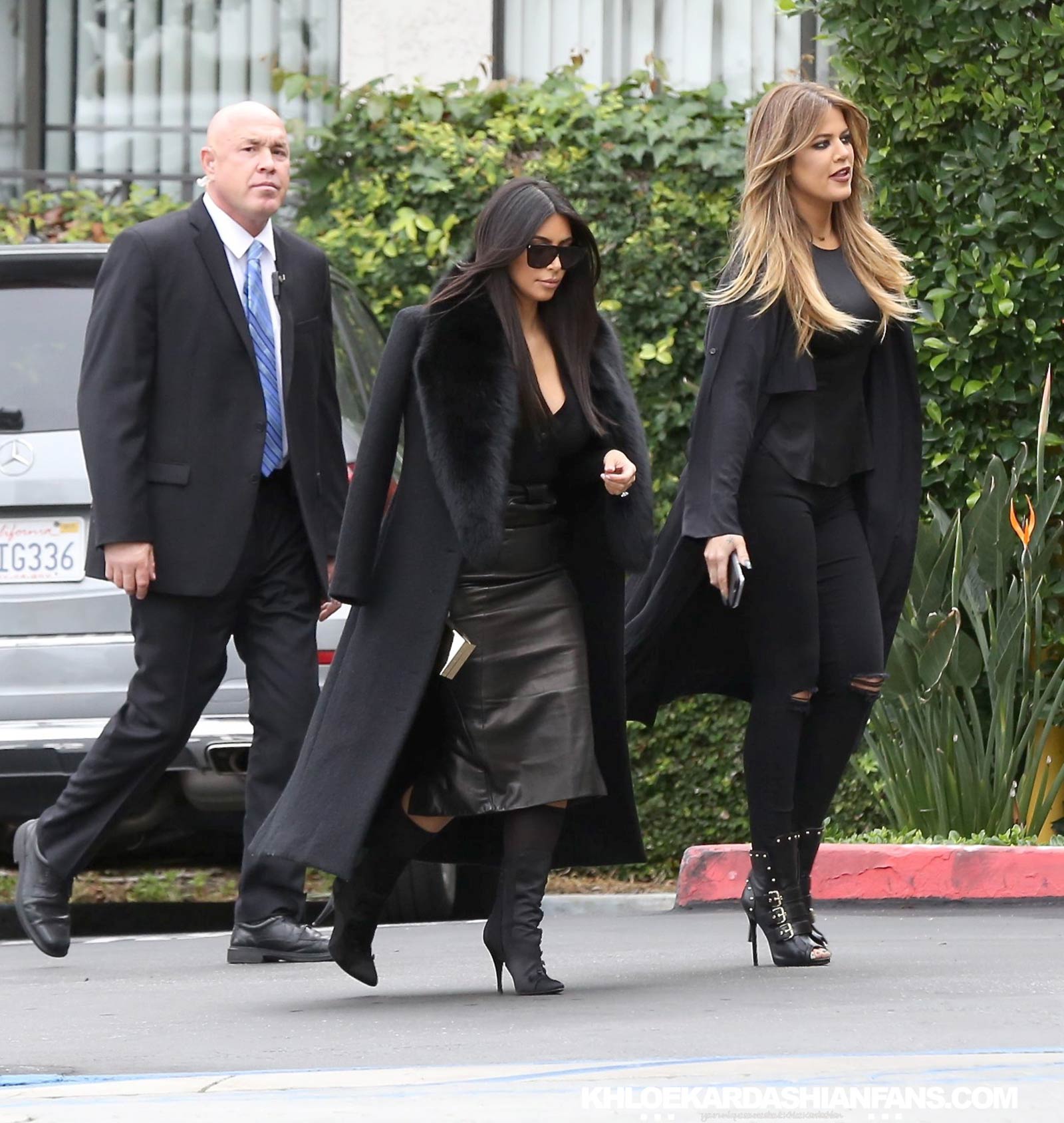 Kim & Khloe Kardashian arriving at Jenner Communications