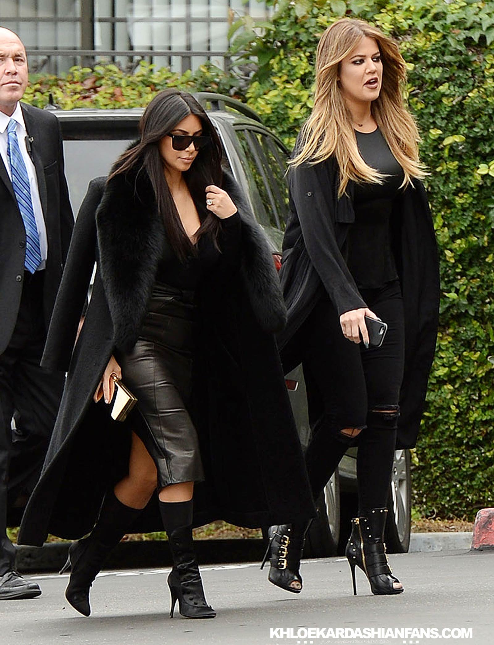 Kim & Khloe Kardashian arriving at Jenner Communications