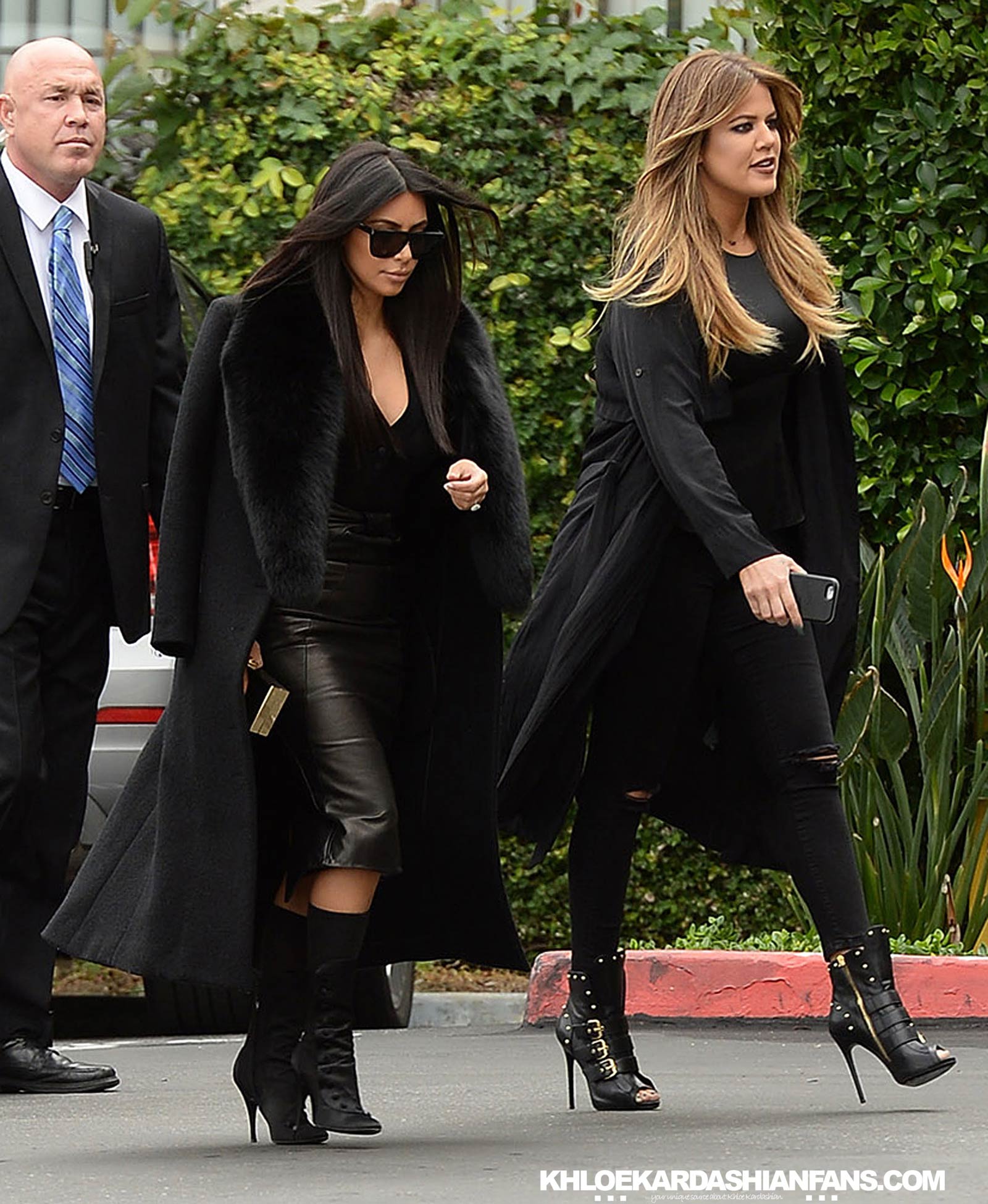 Kim & Khloe Kardashian arriving at Jenner Communications