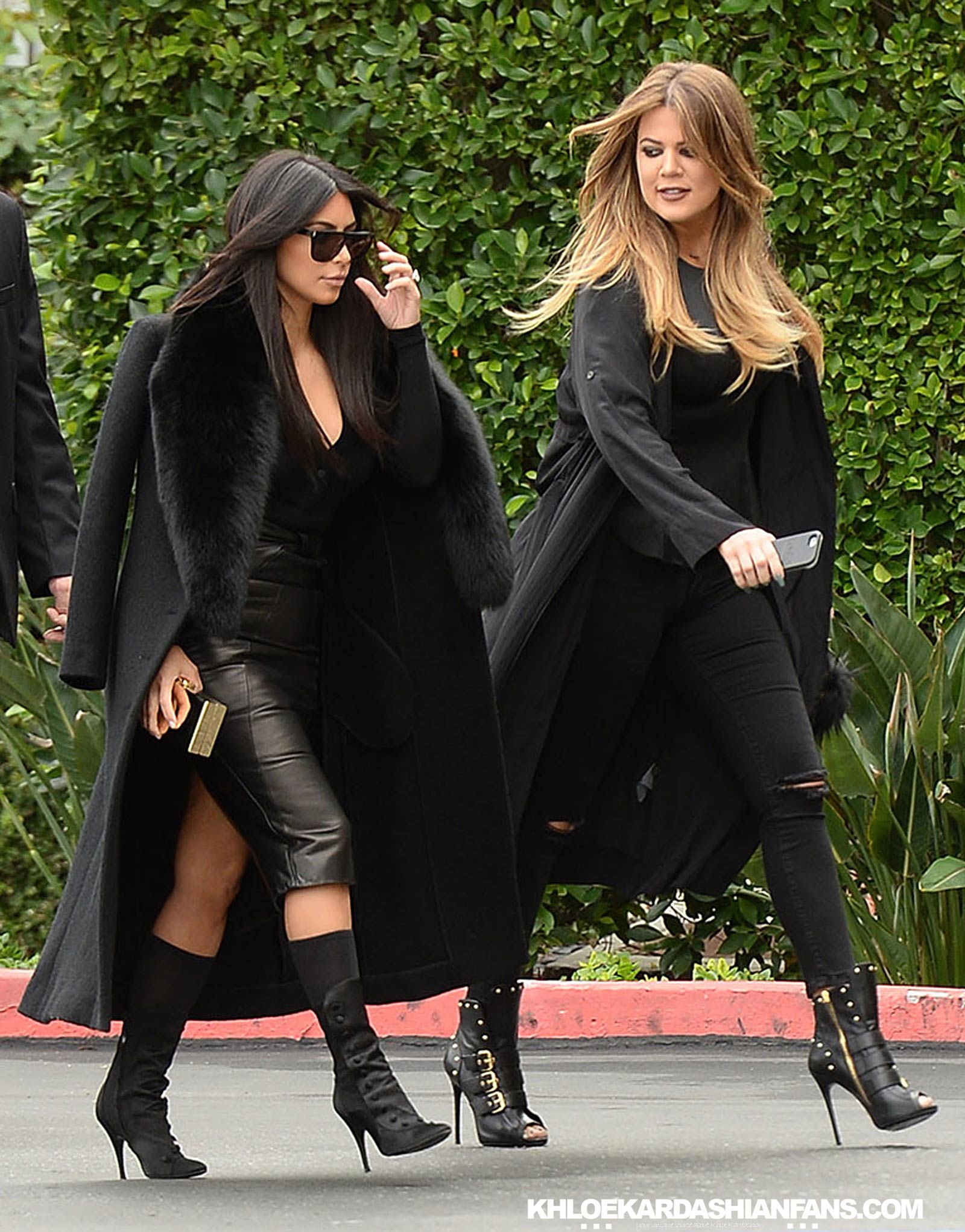 Kim & Khloe Kardashian arriving at Jenner Communications