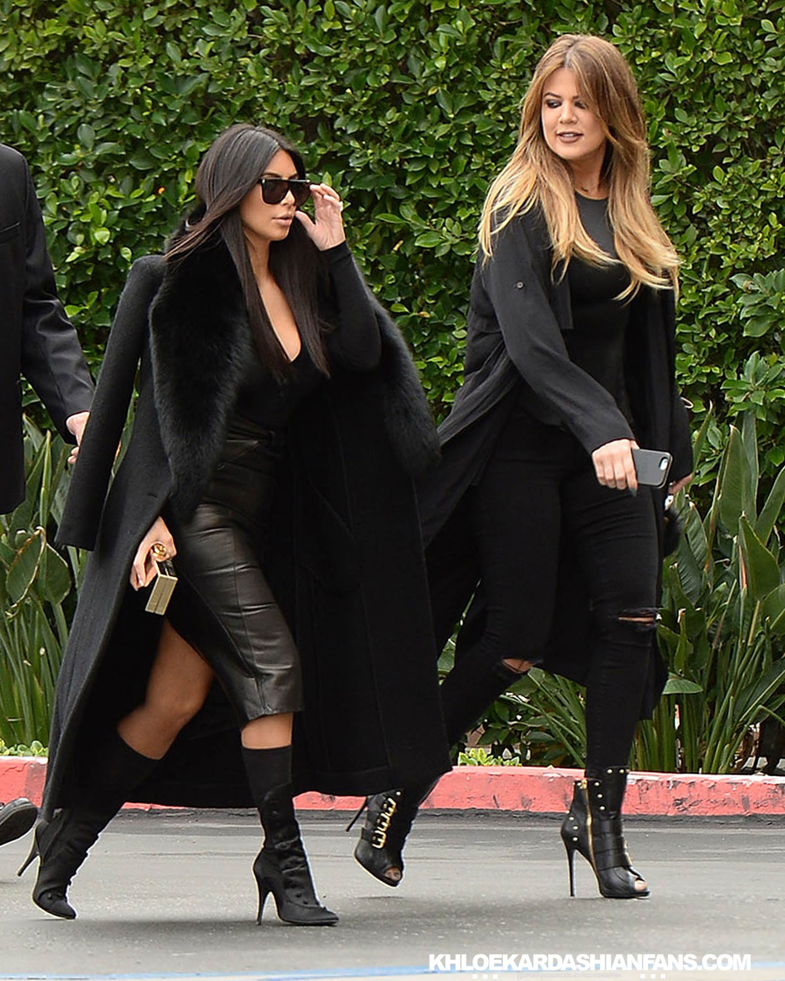 Kim & Khloe Kardashian arriving at Jenner Communications