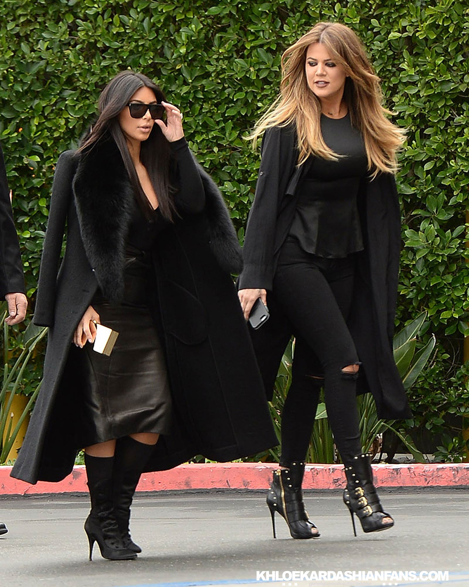 Kim & Khloe Kardashian arriving at Jenner Communications