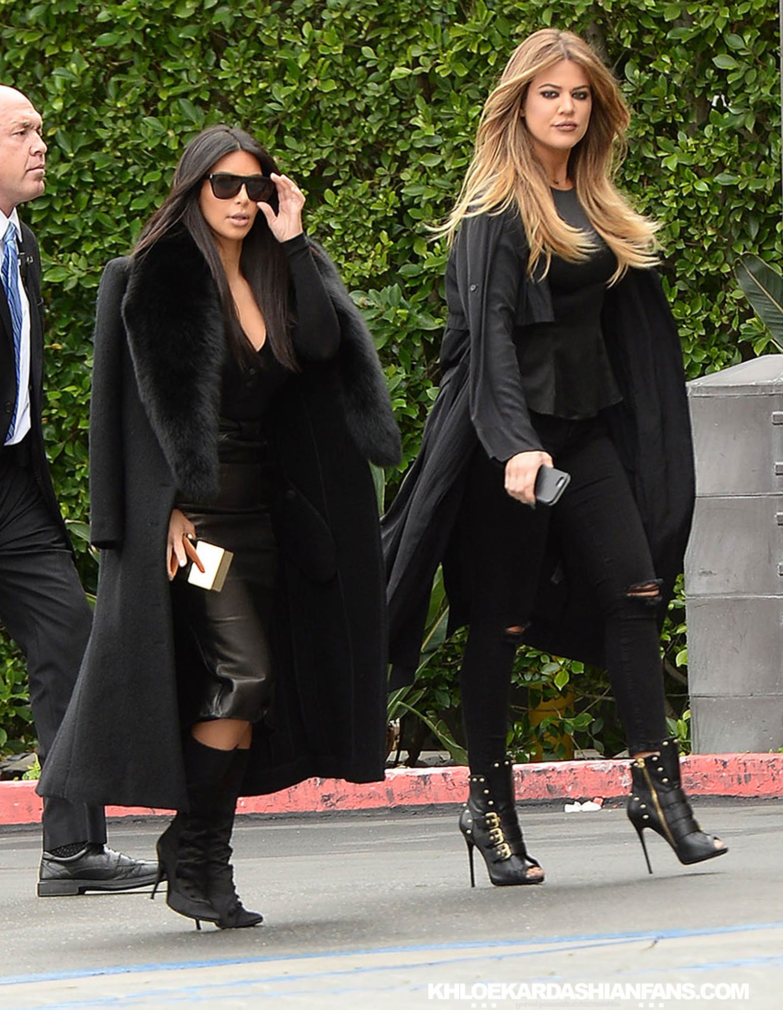 Kim & Khloe Kardashian arriving at Jenner Communications