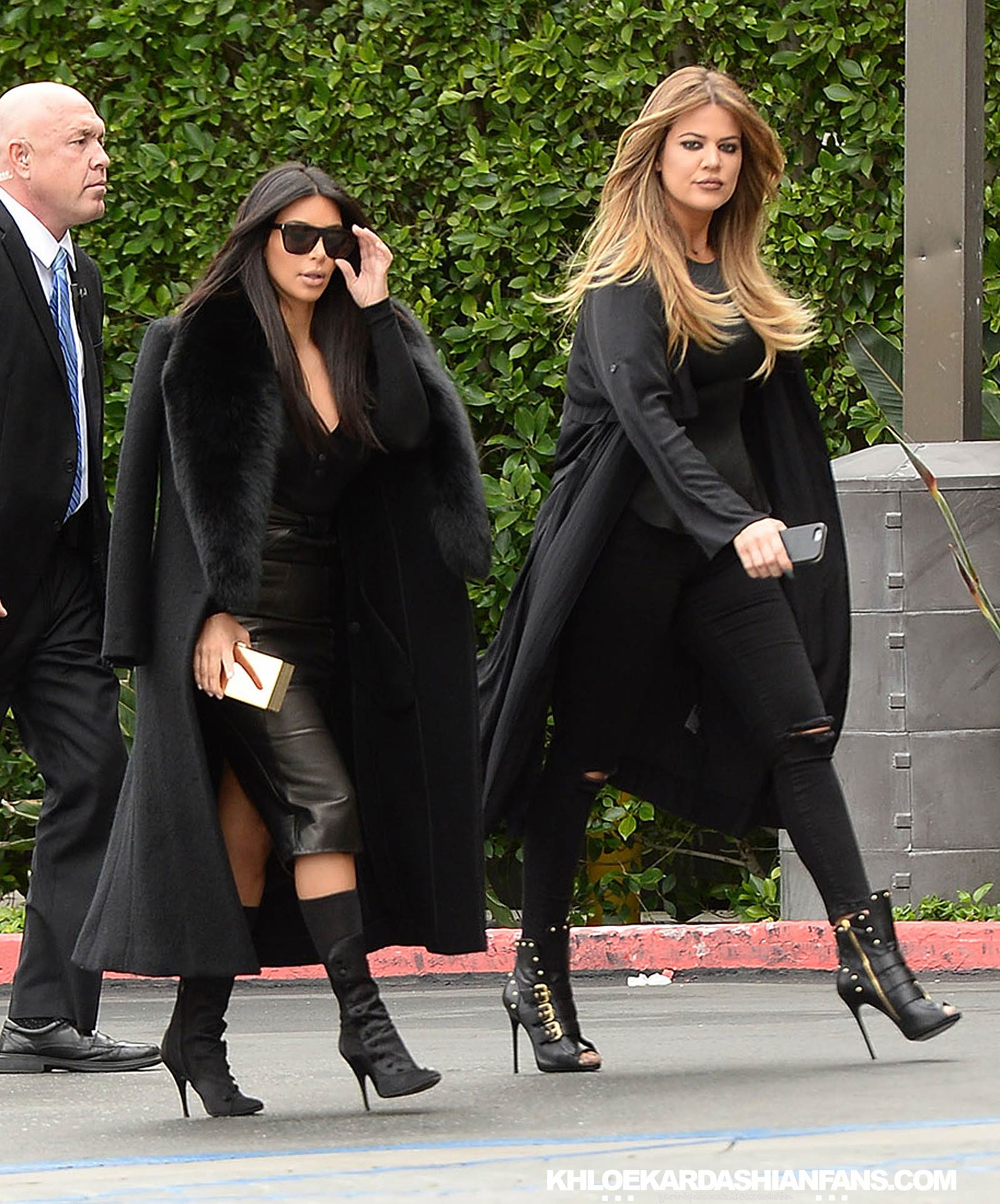 Kim & Khloe Kardashian arriving at Jenner Communications