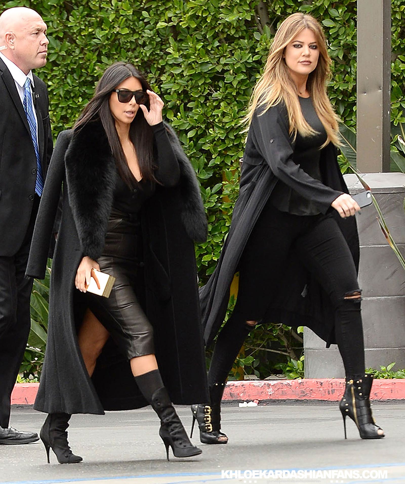 Kim & Khloe Kardashian arriving at Jenner Communications