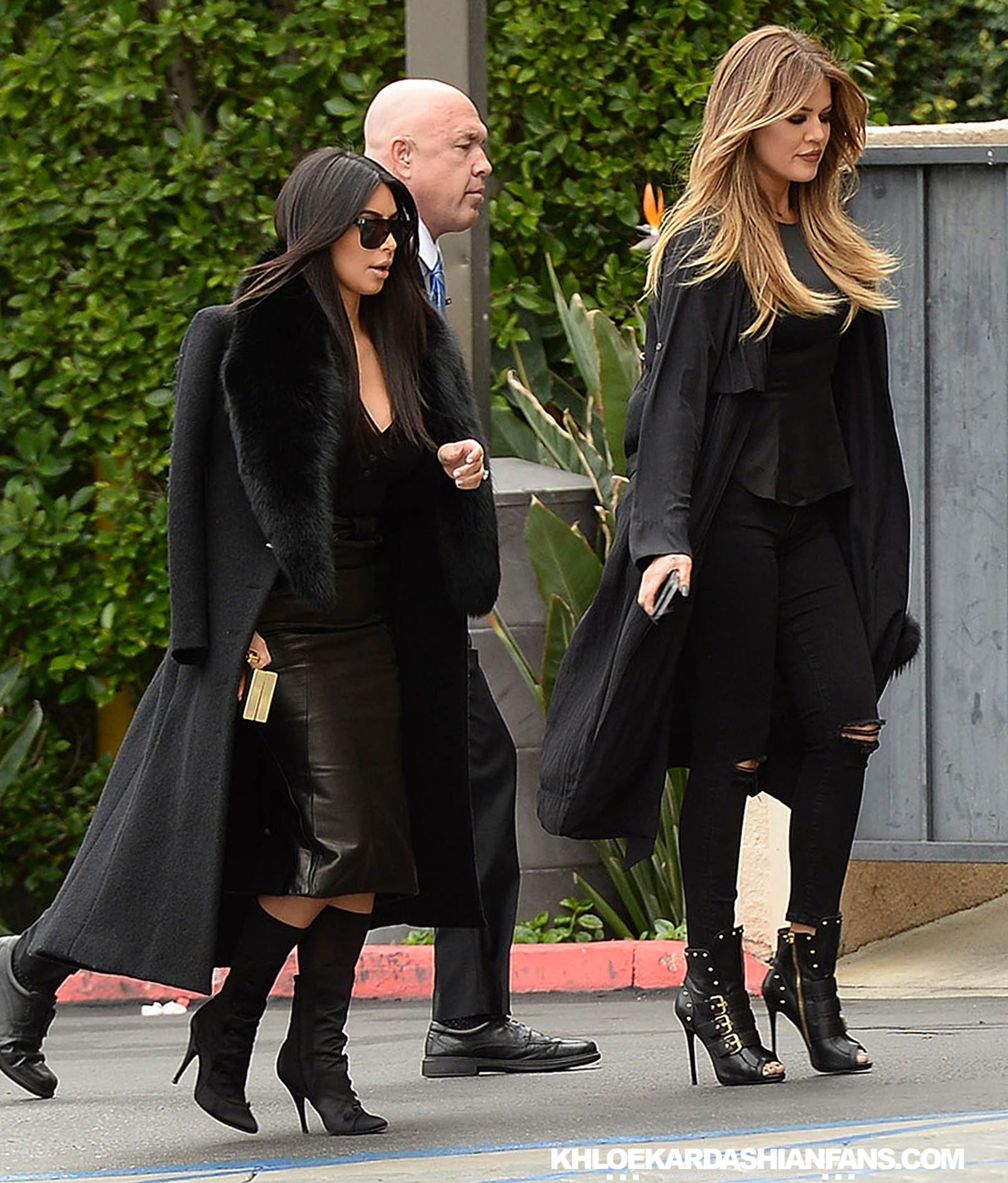 Kim & Khloe Kardashian arriving at Jenner Communications
