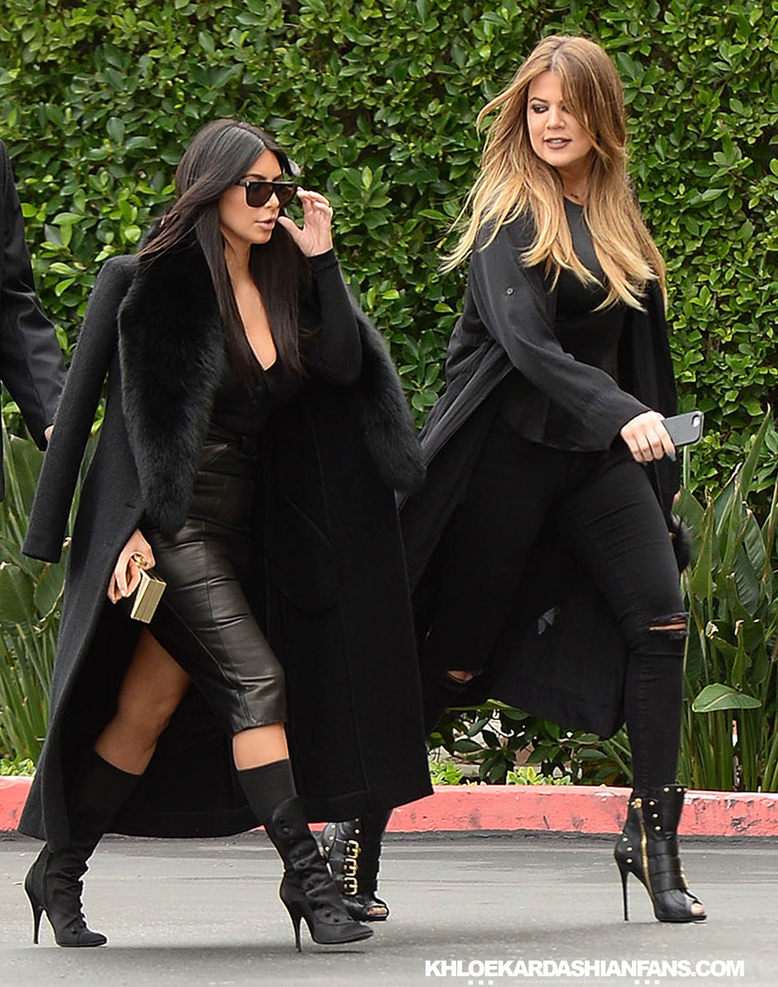 Kim & Khloe Kardashian arriving at Jenner Communications