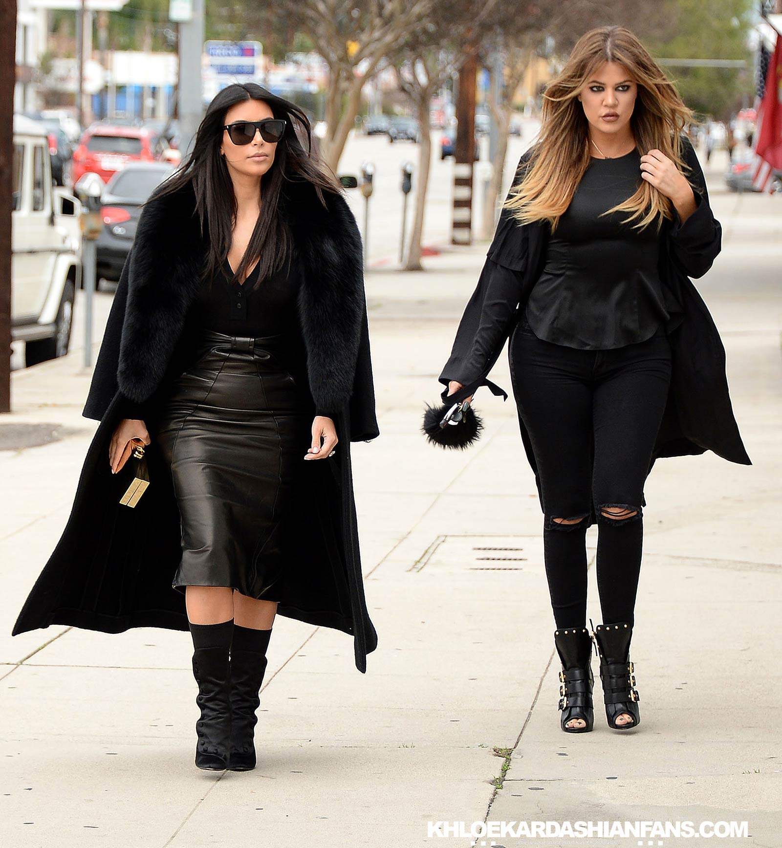 Kim & Khloe Kardashian arriving at Jenner Communications