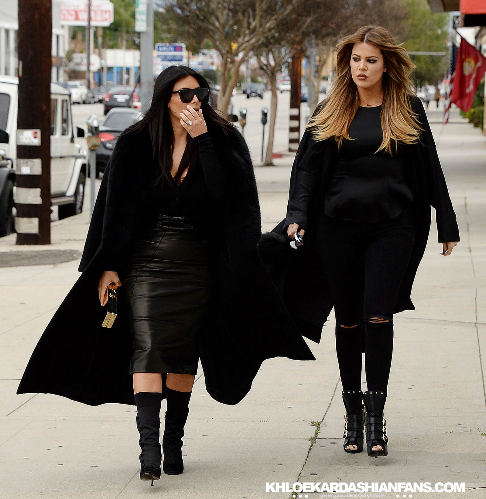 Kim & Khloe Kardashian arriving at Jenner Communications