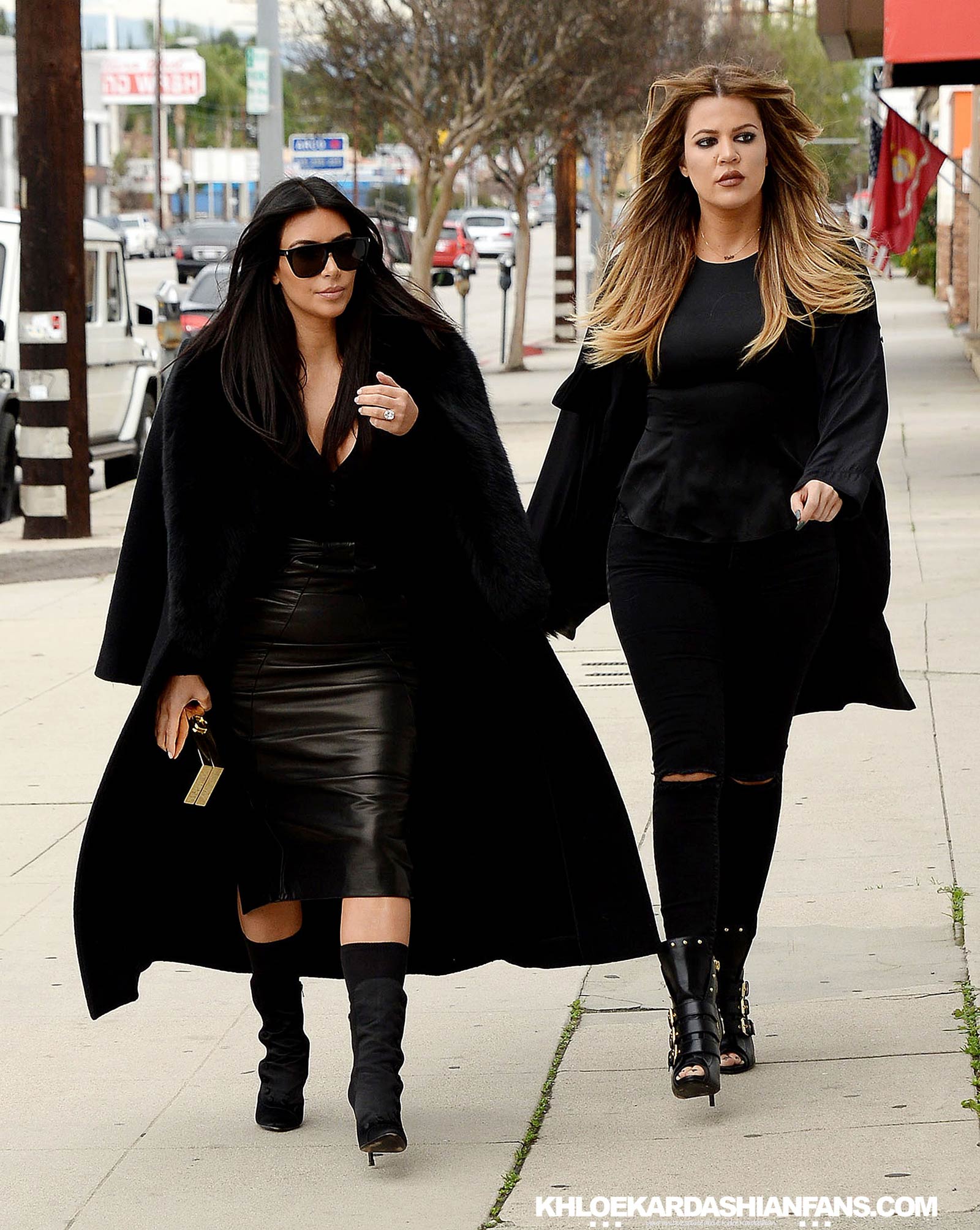 Kim & Khloe Kardashian arriving at Jenner Communications