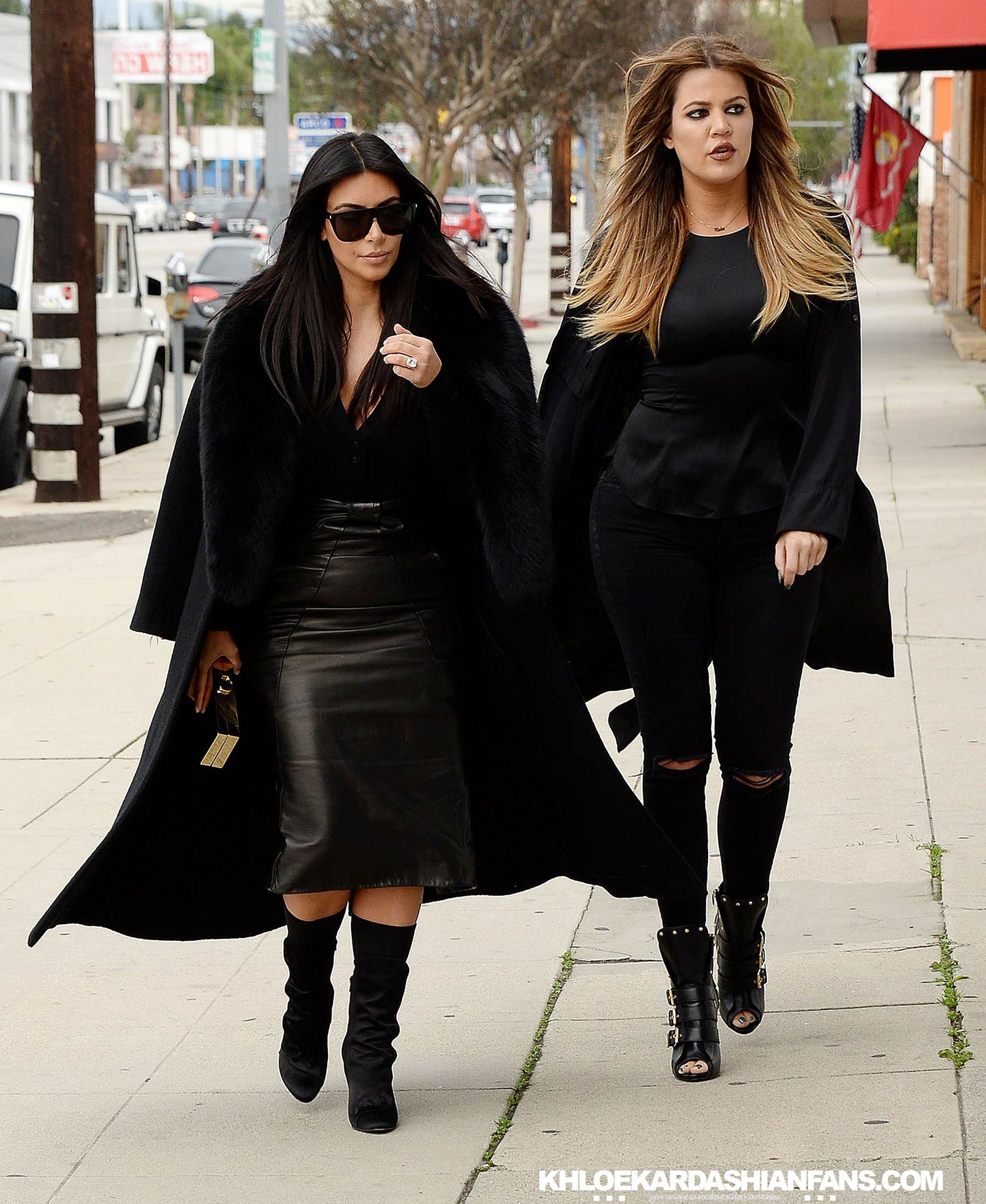 Kim & Khloe Kardashian arriving at Jenner Communications