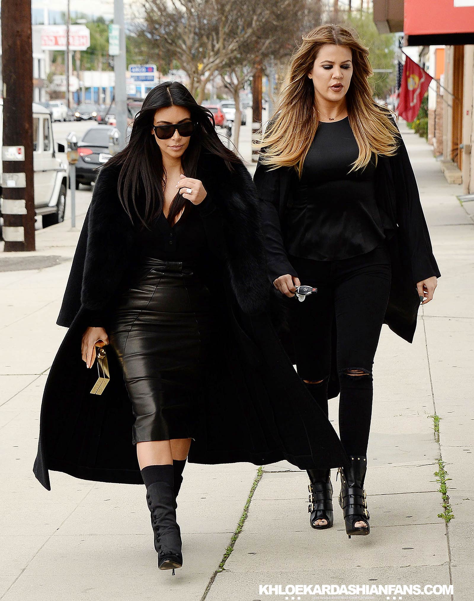 Kim & Khloe Kardashian arriving at Jenner Communications