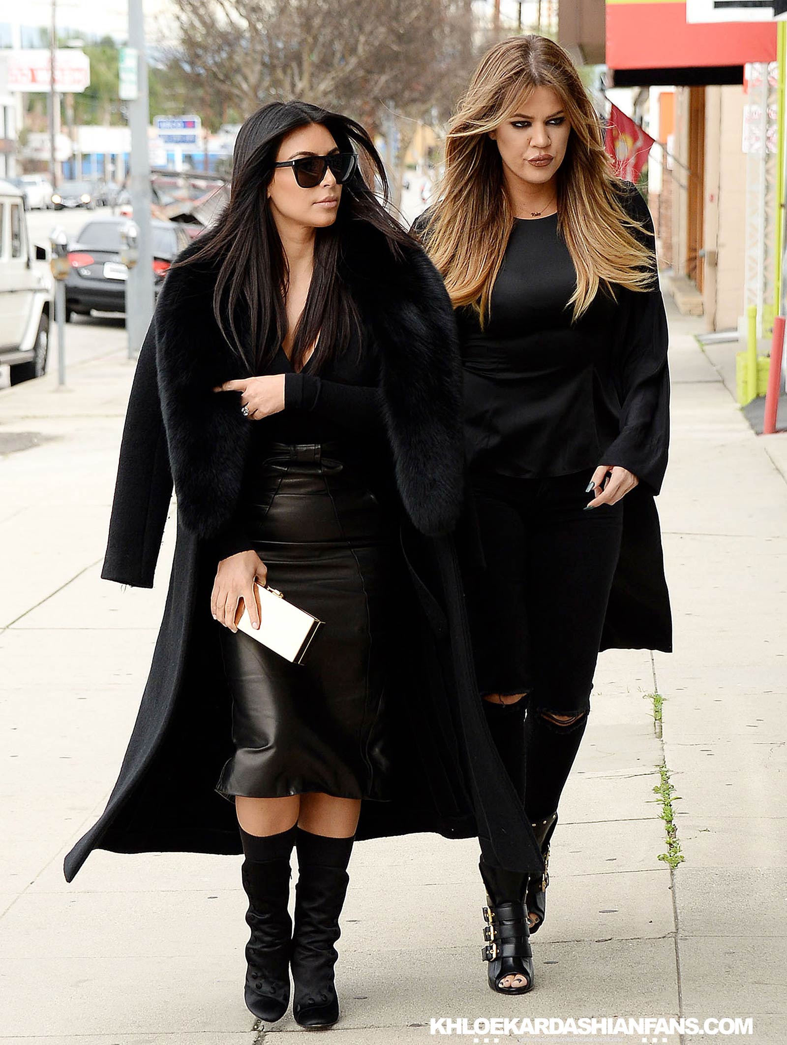 Kim & Khloe Kardashian arriving at Jenner Communications