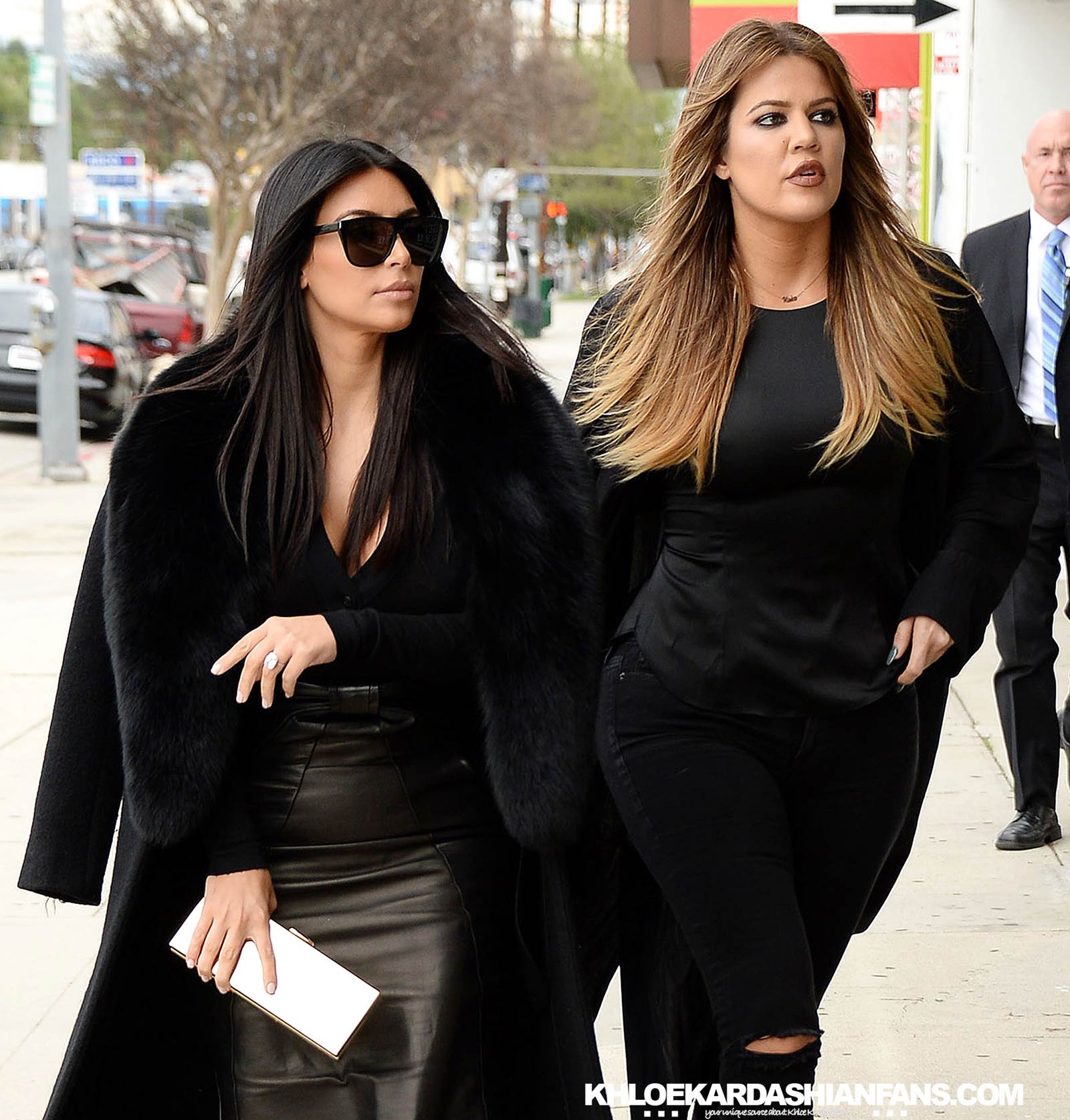 Kim & Khloe Kardashian arriving at Jenner Communications