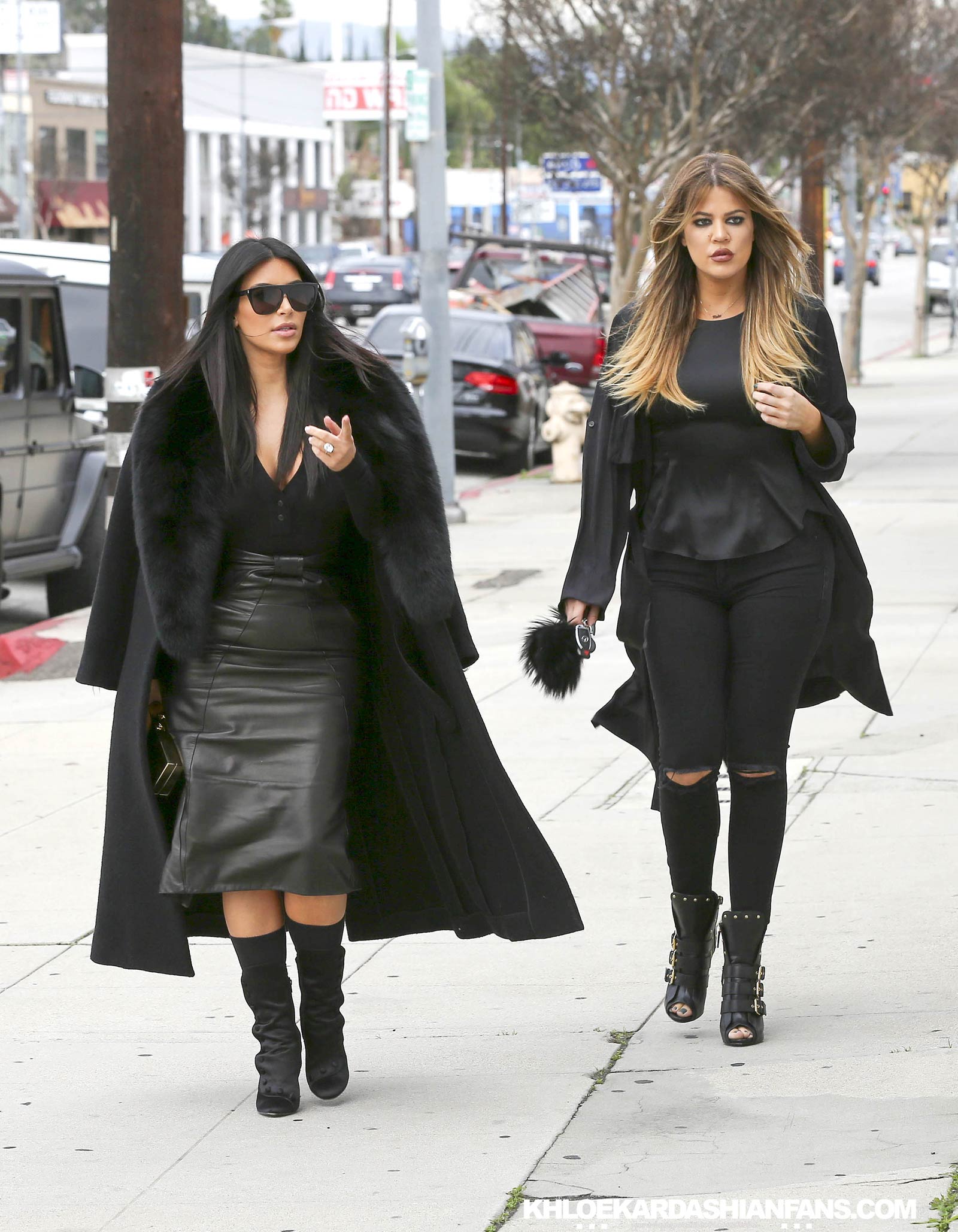 Kim & Khloe Kardashian arriving at Jenner Communications