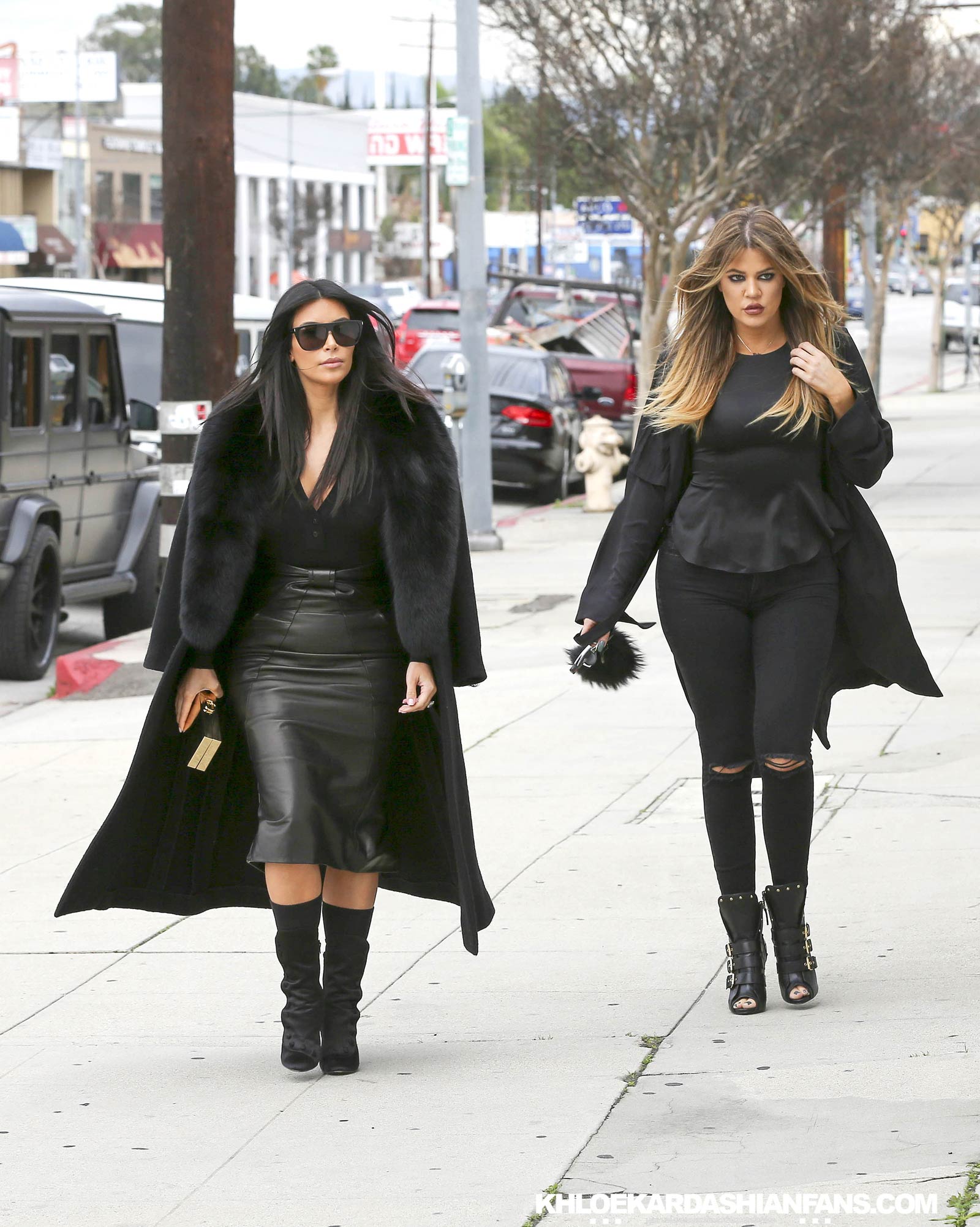 Kim & Khloe Kardashian arriving at Jenner Communications