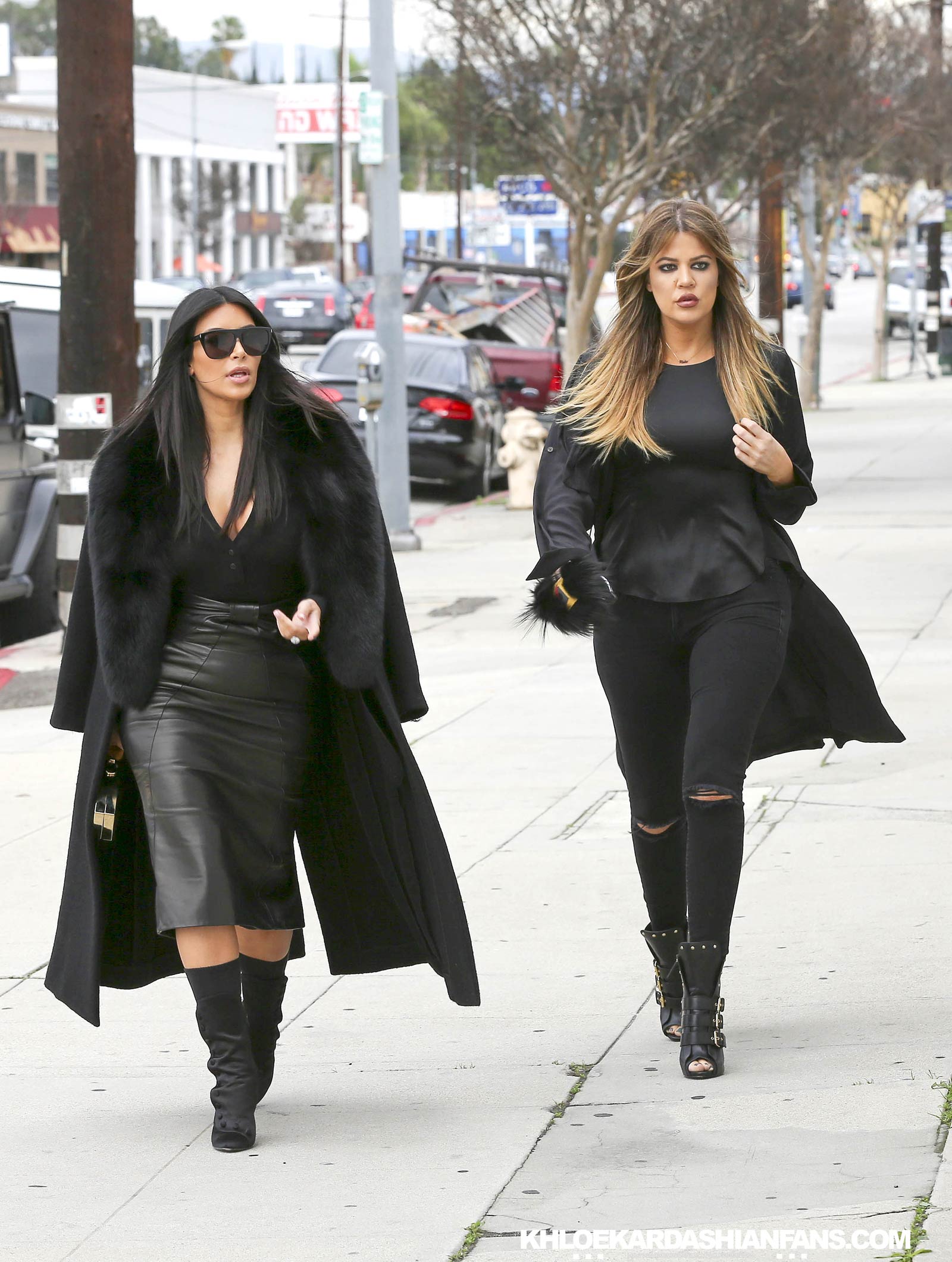 Kim & Khloe Kardashian arriving at Jenner Communications