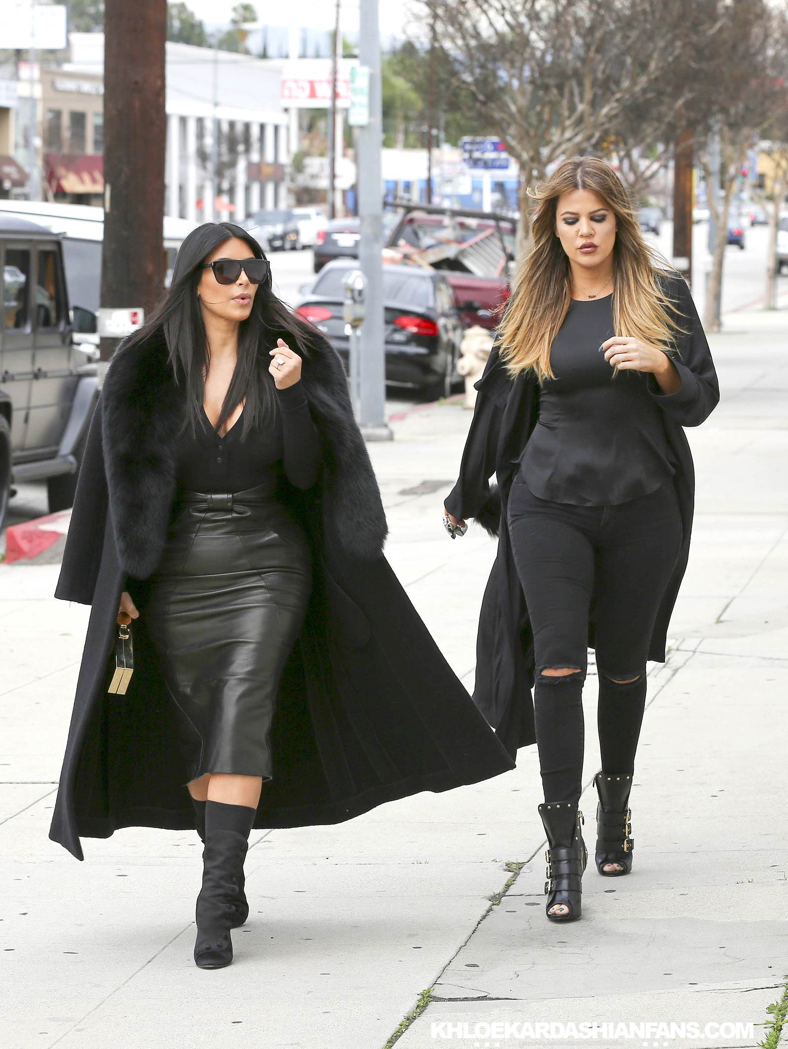 Kim & Khloe Kardashian arriving at Jenner Communications