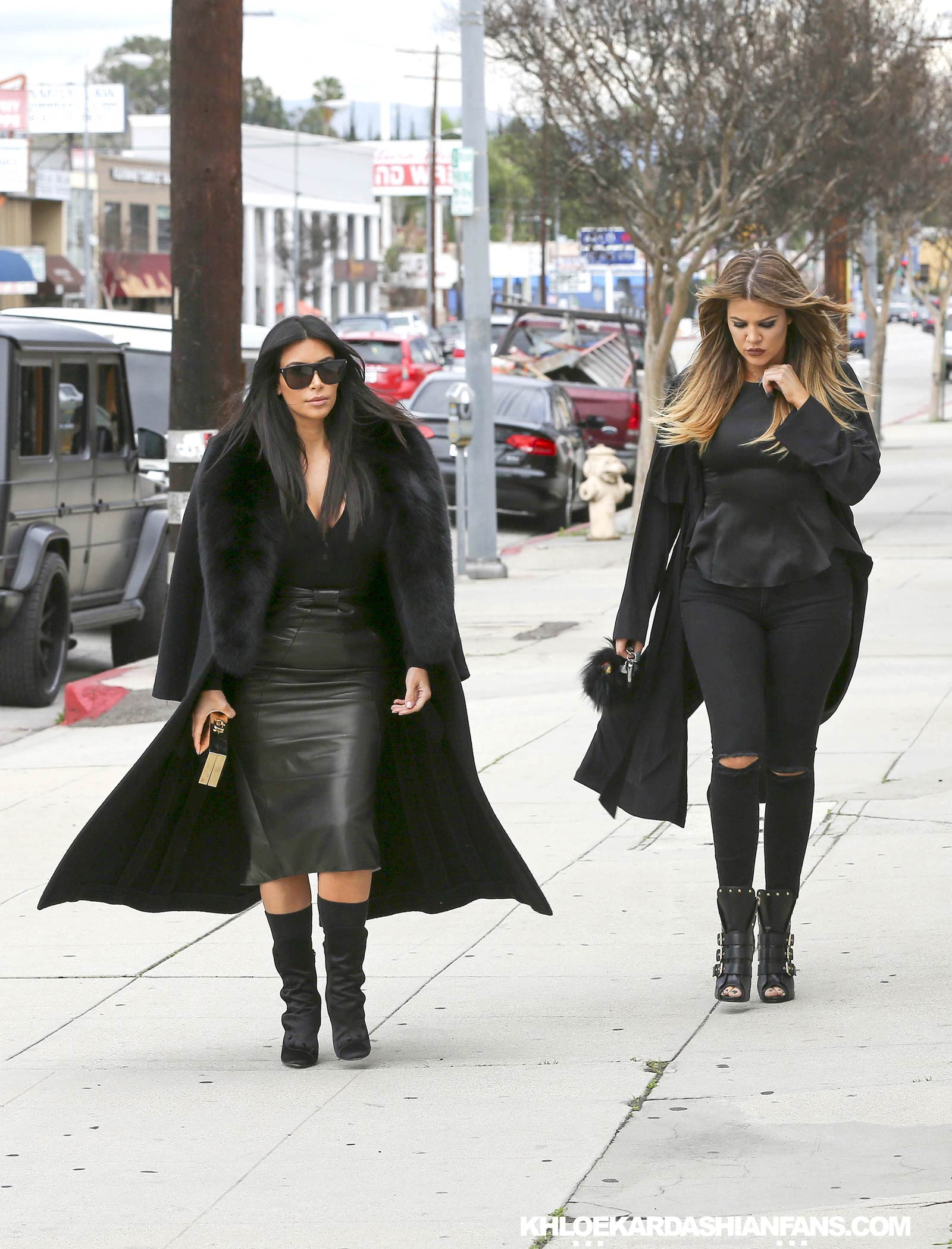 Kim & Khloe Kardashian arriving at Jenner Communications