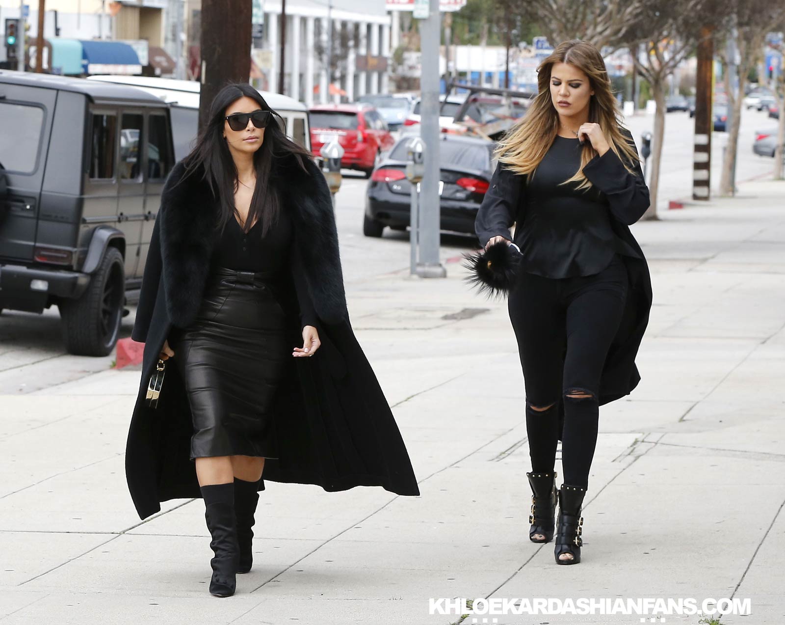 Kim & Khloe Kardashian arriving at Jenner Communications