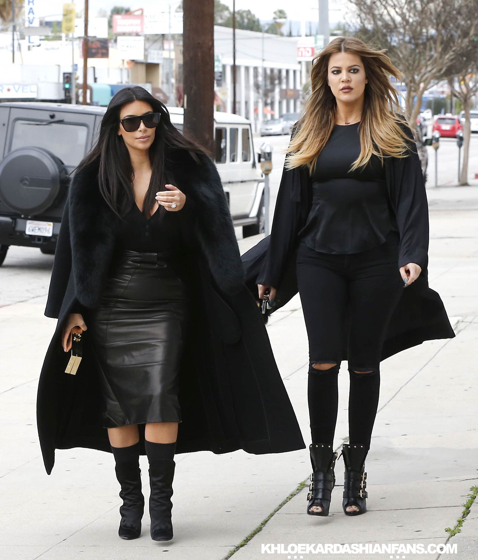 Kim & Khloe Kardashian arriving at Jenner Communications