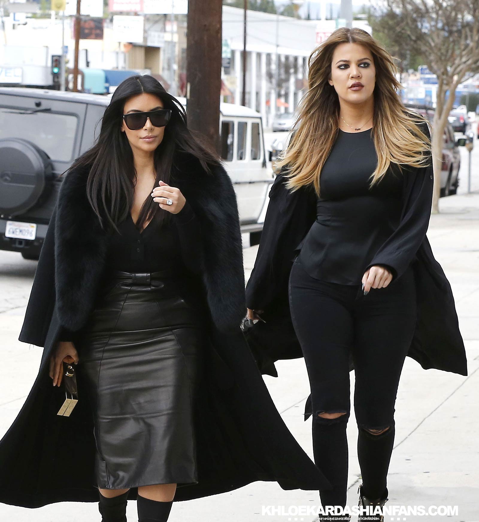 Kim & Khloe Kardashian arriving at Jenner Communications