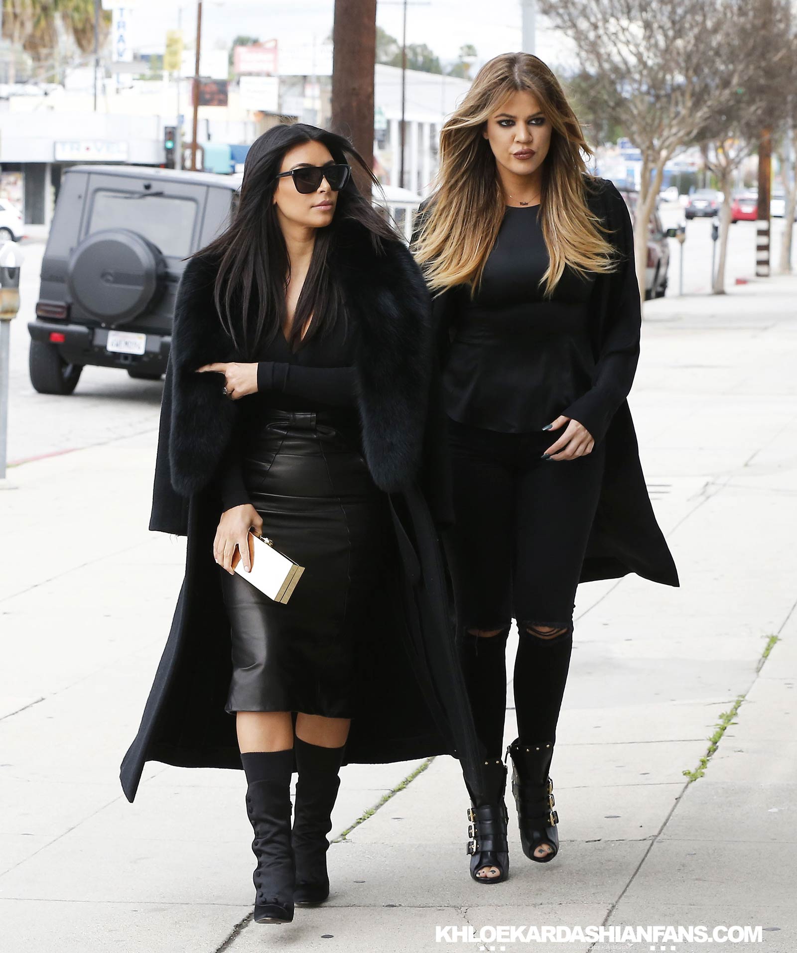 Kim & Khloe Kardashian arriving at Jenner Communications