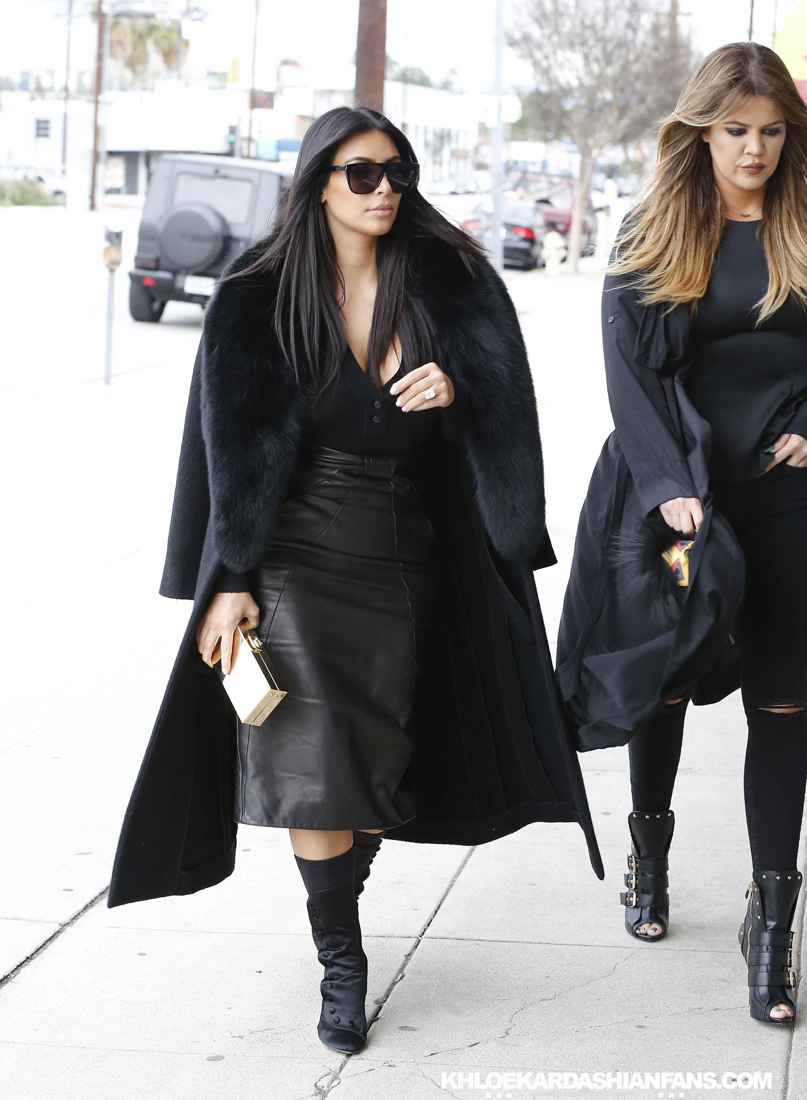 Kim & Khloe Kardashian arriving at Jenner Communications