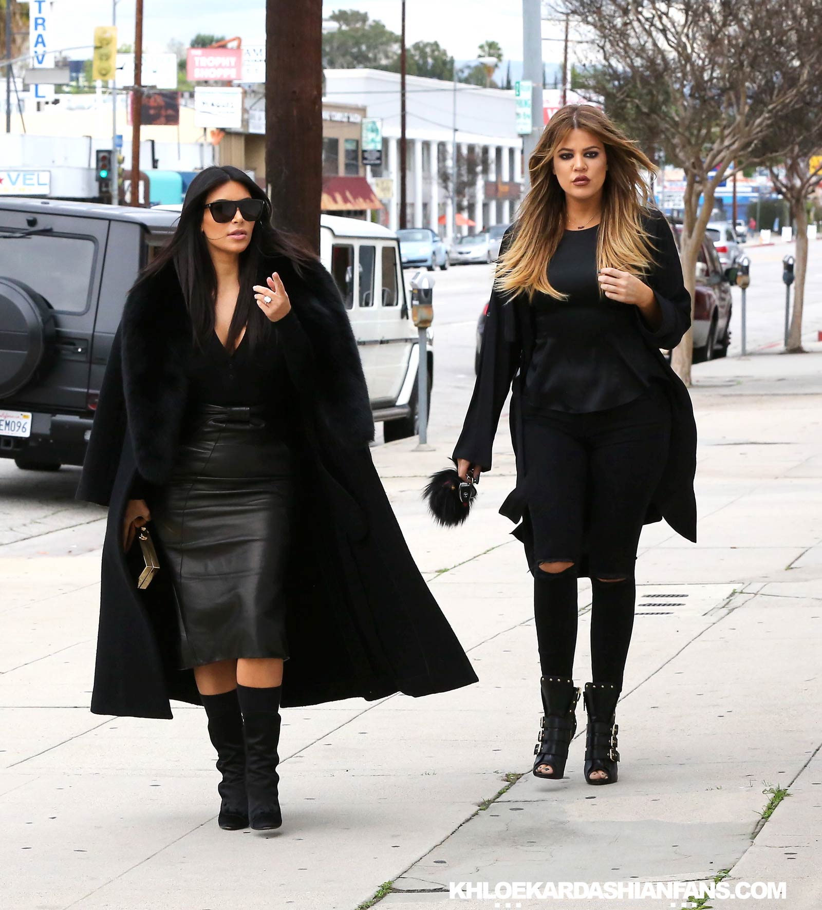 Kim & Khloe Kardashian arriving at Jenner Communications