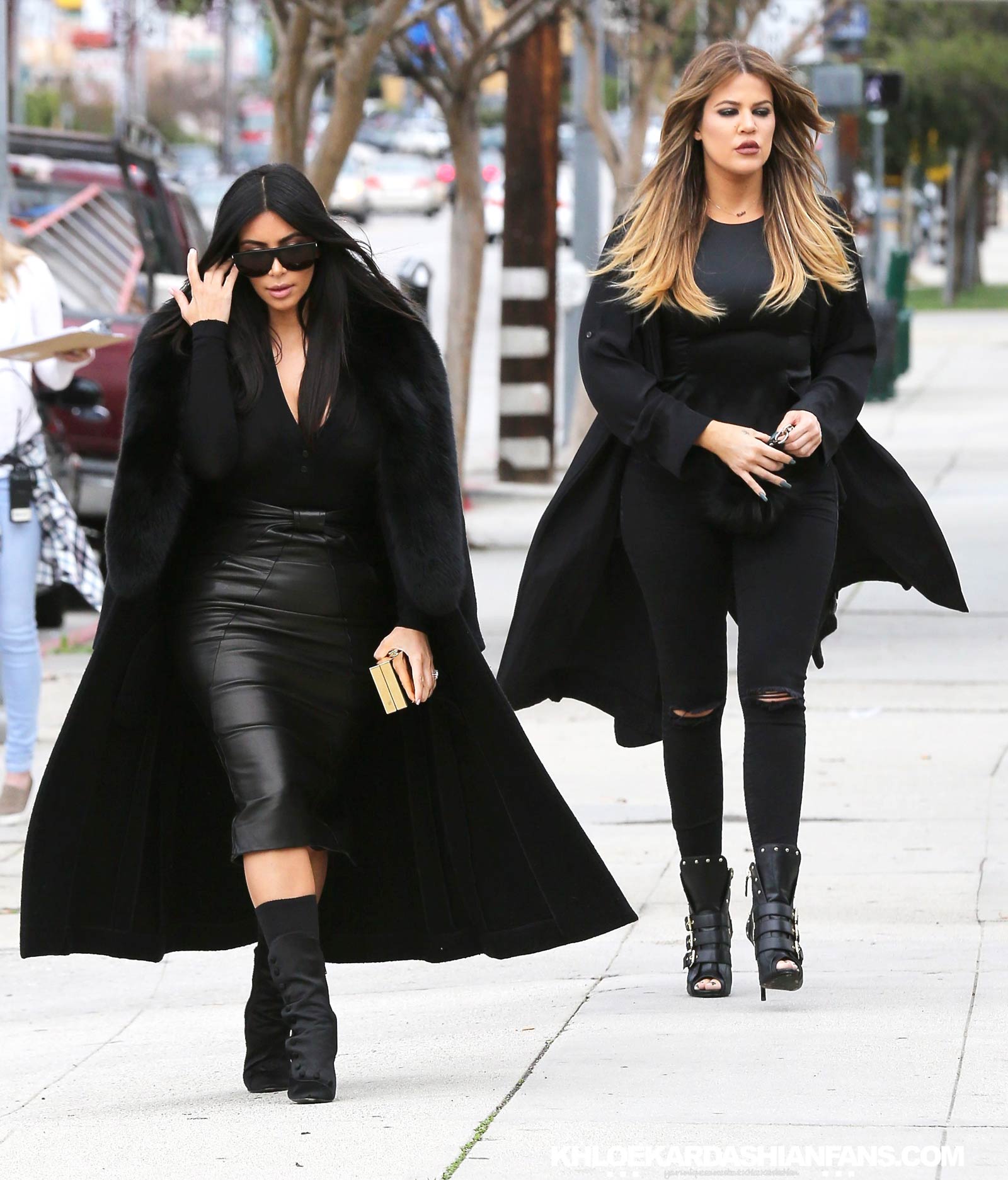 Kim & Khloe Kardashian arriving at Jenner Communications