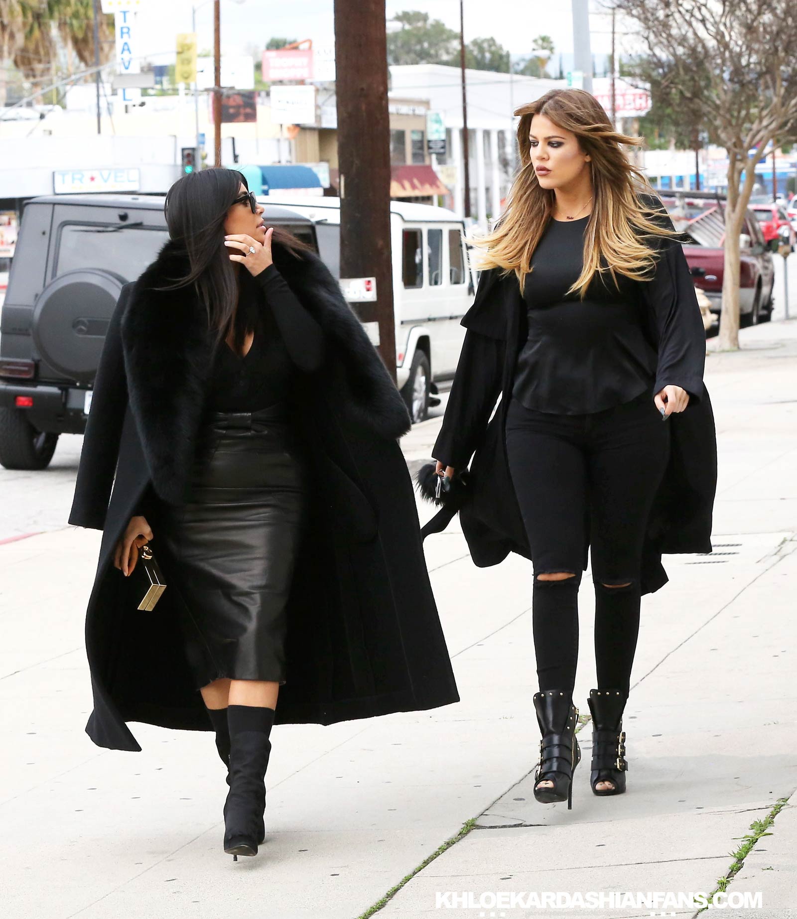 Kim & Khloe Kardashian arriving at Jenner Communications