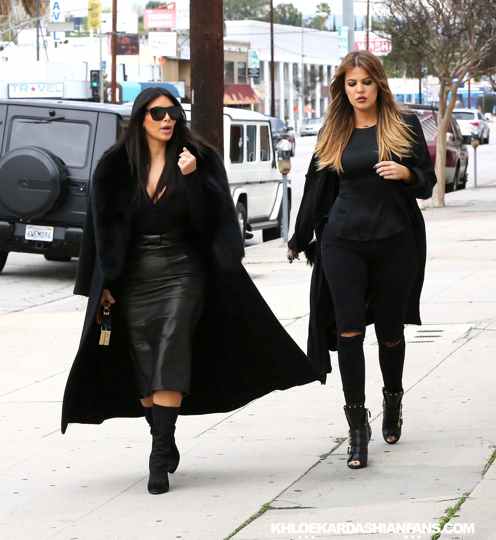 Kim & Khloe Kardashian arriving at Jenner Communications