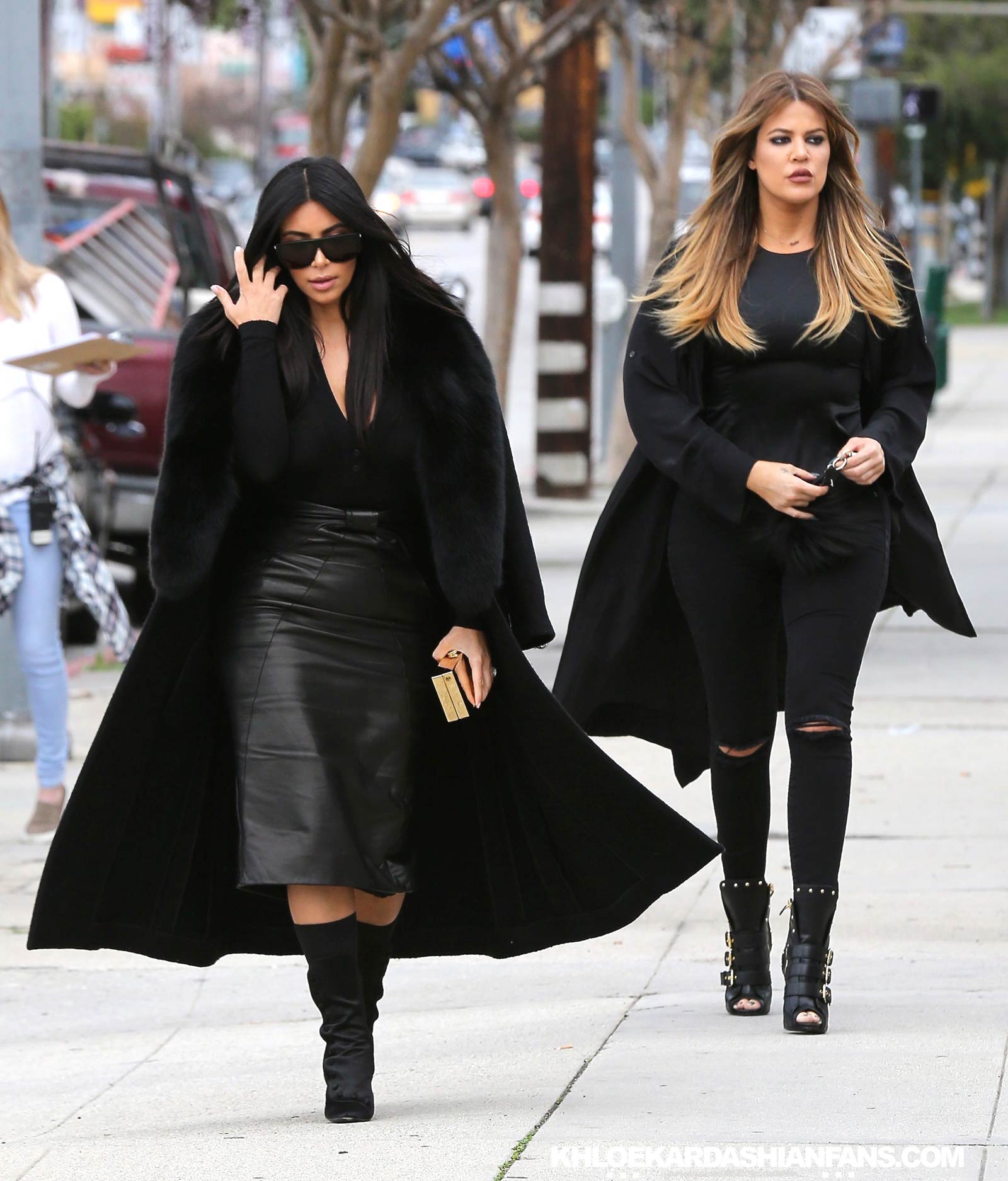 Kim & Khloe Kardashian arriving at Jenner Communications